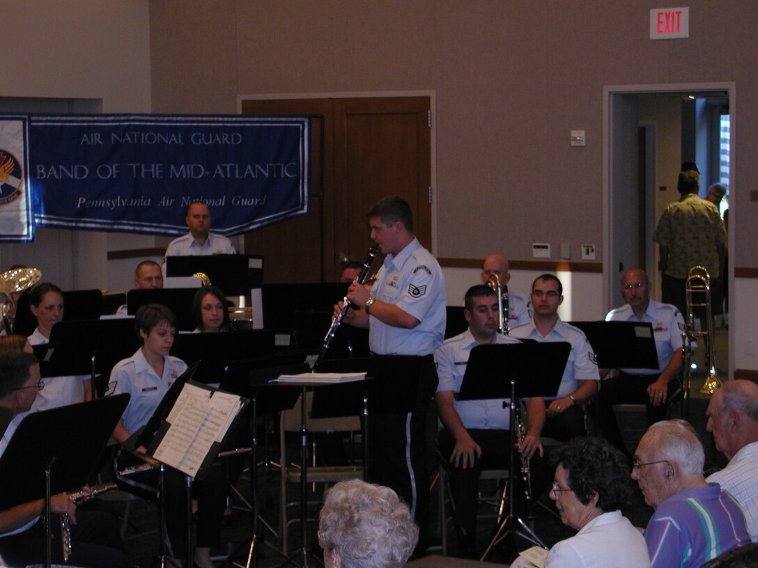 ANG Band of the Mid-Atlantic Concert Band prepares for a concert at Nicarry Meeting House in New Oxford PA on Saturday June 27, 2009.  
