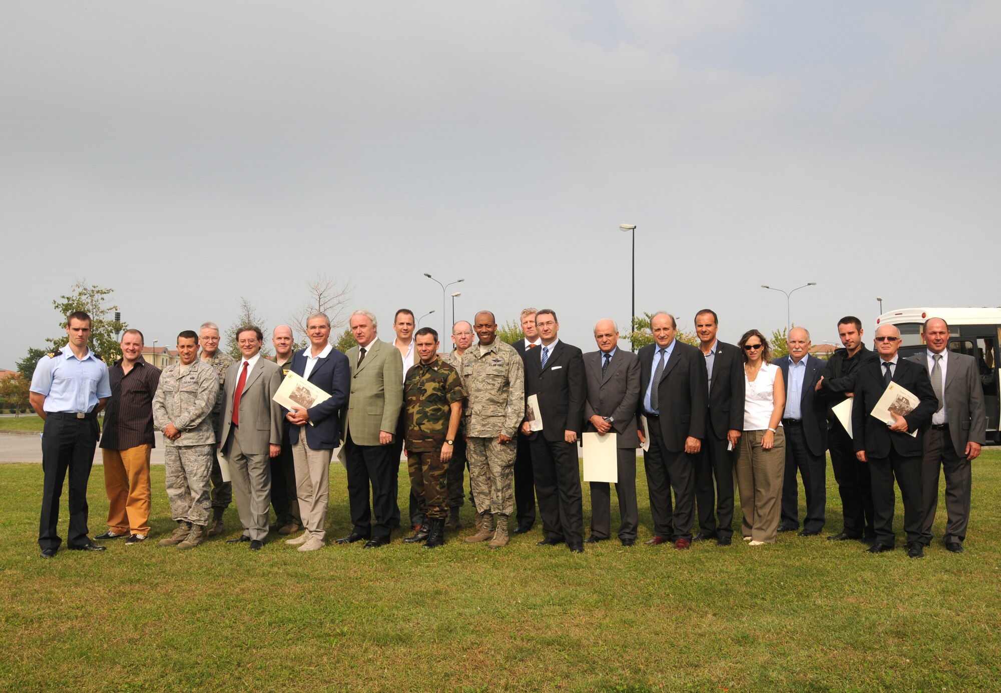 Brig. Gen. C.Q. Brown Jr. (middle), 31st Fighter Wing commander, Col. Filippo Zampella, Italian Air Force "Pagliano e Gori" Airport commander, and other Aviano Air Base leaders visit with 13 local Italian mayors and representatives Sept. 30, 2009 at Aviano AB, Italy. (U.S. Air Force photo/Staff Sgt. Patrick Dixon)
