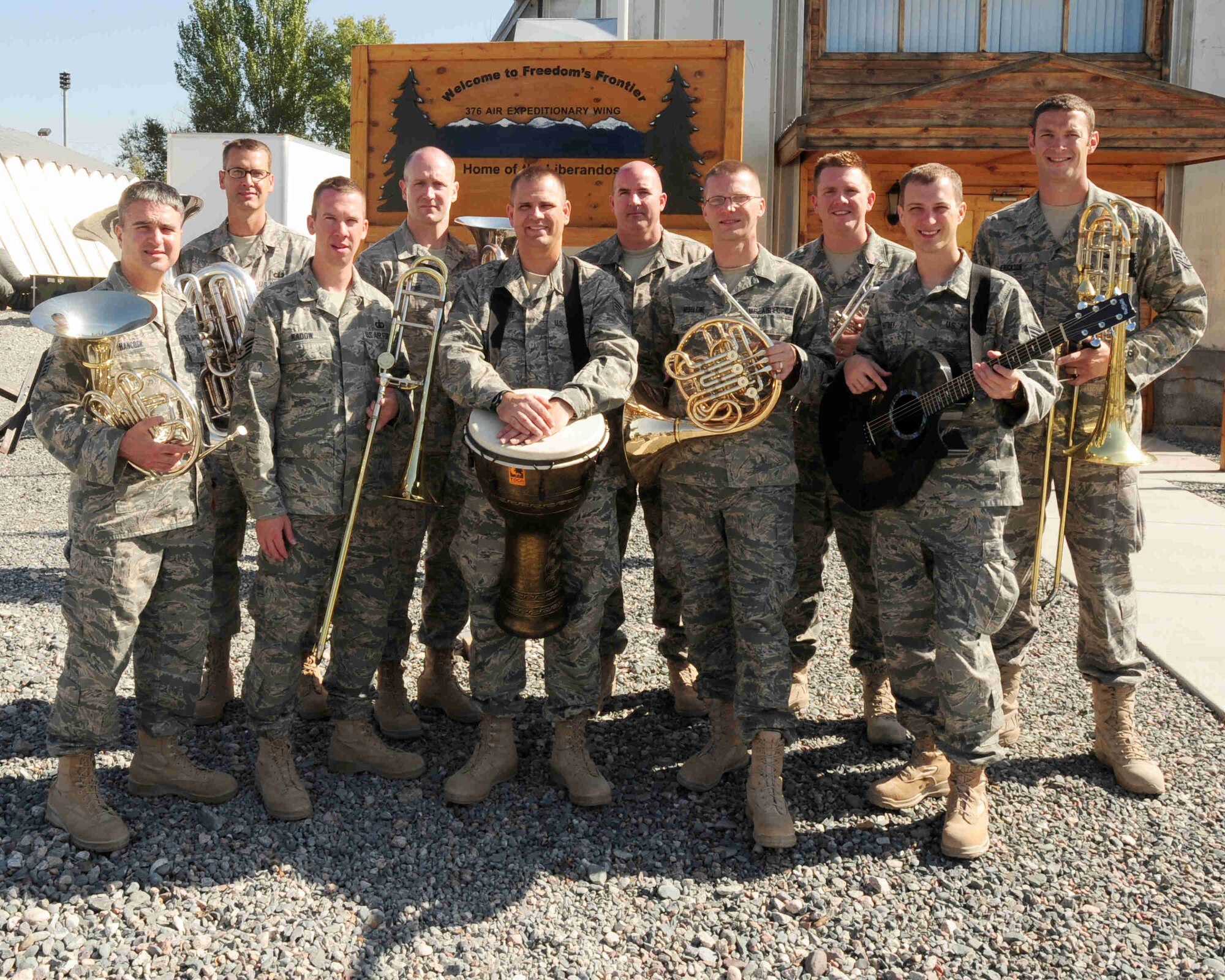 TRANSIT CENTER AT MANAS, Kyrgyzstan -- The U.S. Air Forces Central Command 'Falcon' Band became very popular in Kyrgyzstan after performing five shows throughout the country. The Sergeants are stationed at a base in Southwest Asia and are deployed from Offutt Air Force Base, Neb. They are, from left, Tech. Sgt. Hughey Hancock, French horn, Staff Sgt. Mark Barnette, tuba, Staff Sgt. Benjamin Kadow, trombone, Tech. Sgt. Matthew Dunsmore, euphonium, Tech. Sgt. James Mangette, percussionist, Staff Sgt. Eric Proper, trumpet, Tech. Sgt. Patrick Heseltine, French horn, Staff Sgt. Jeffrey Reich, trumpet, Staff Sgt. Clinton Whitney, vocalist, and Staff Sgt. Matthew Erickson, bass trombone. (U.S. Air Force photo/Senior Airman Steele C. G. Britton)