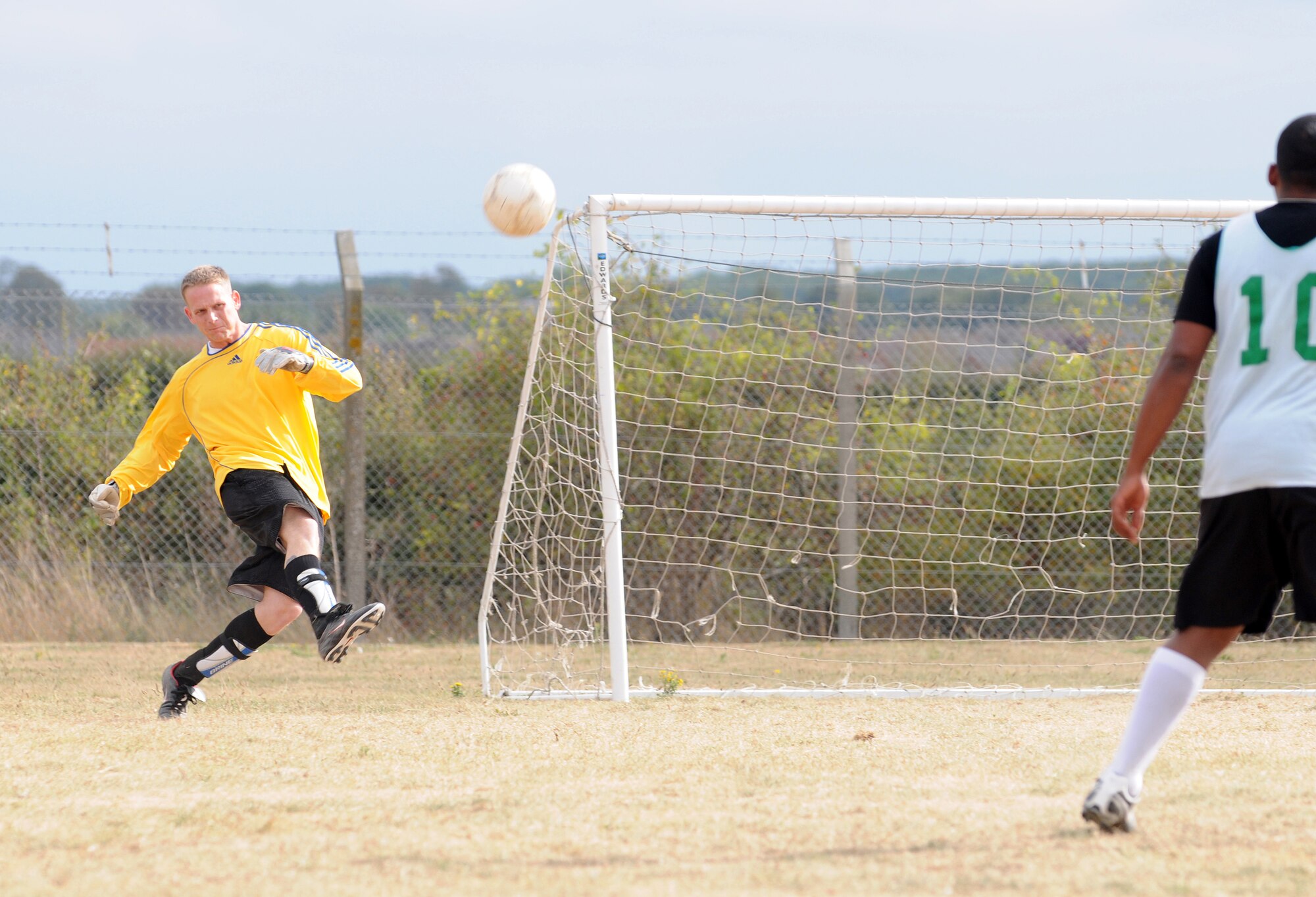 RAF MILDENHALL, England -- Marty Boyl, 94th Reconnaissance Squadron goal keeper, takes a goal kick in an intramural soccer match near the Hardstand Fitness Center here Sept. 30. After keeping pace with the 100th Logistics Readiness Squadron in regular play, the combined 488th Intelligence Squadron/95th RS team was unable to keep up in overtime and lost the game 3-6. (U.S. Air Force photo/Senior Airman Thomas Trower) 