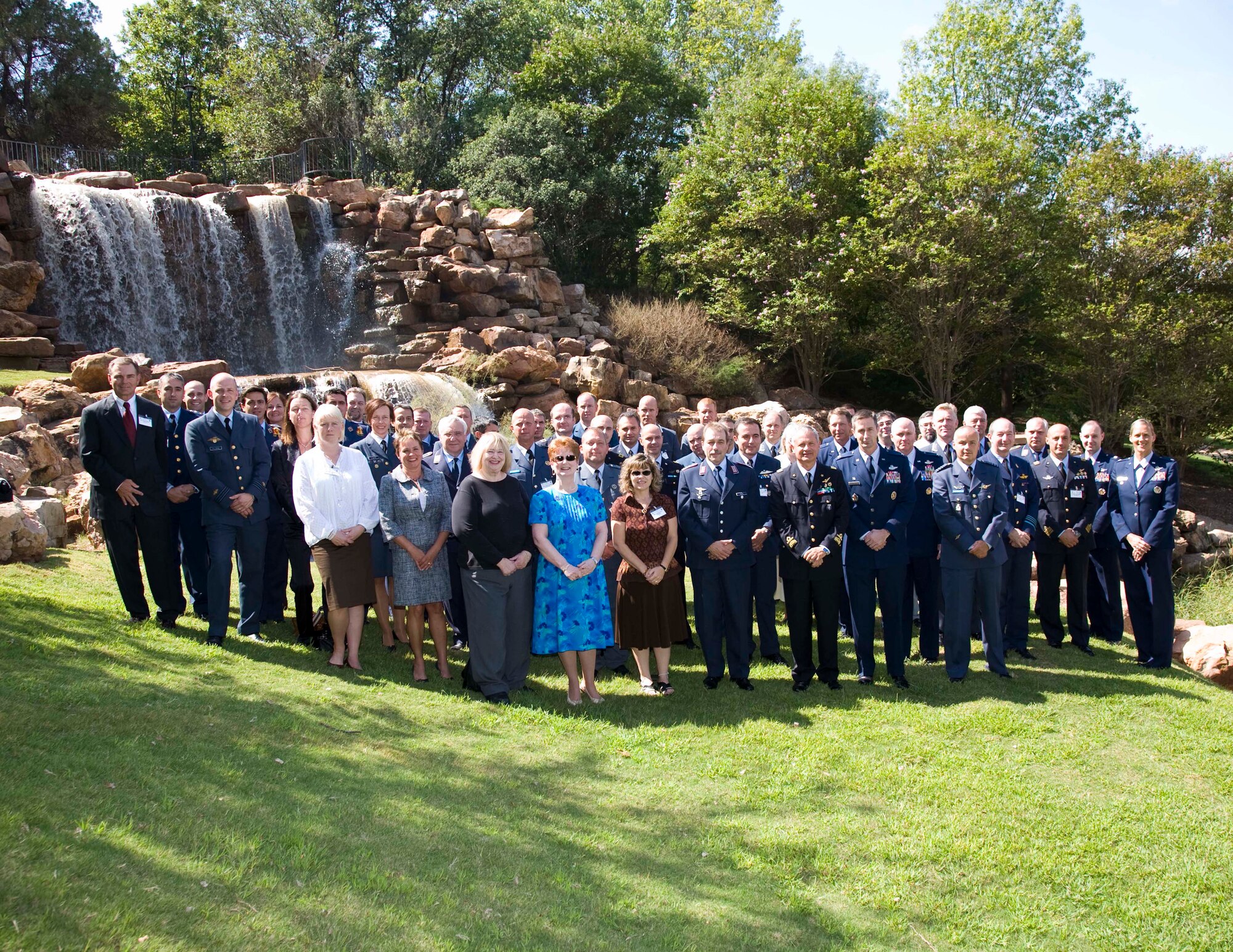 Members of the Euro-NATO Joint Jet Pilot Training Program Steering Committee pose in front of The Falls in Wichita Falls, Texas, Sept. 25, 2009. During their meeting at Sheppard Air Force Base, Texas, they discussed the flow of student pilots, instructor pilot training, leadership and command opportunities, maintenance statistics and plans for ENJJPT. (U.S. Air Force photo/Lt. Col. Ternell Washington)