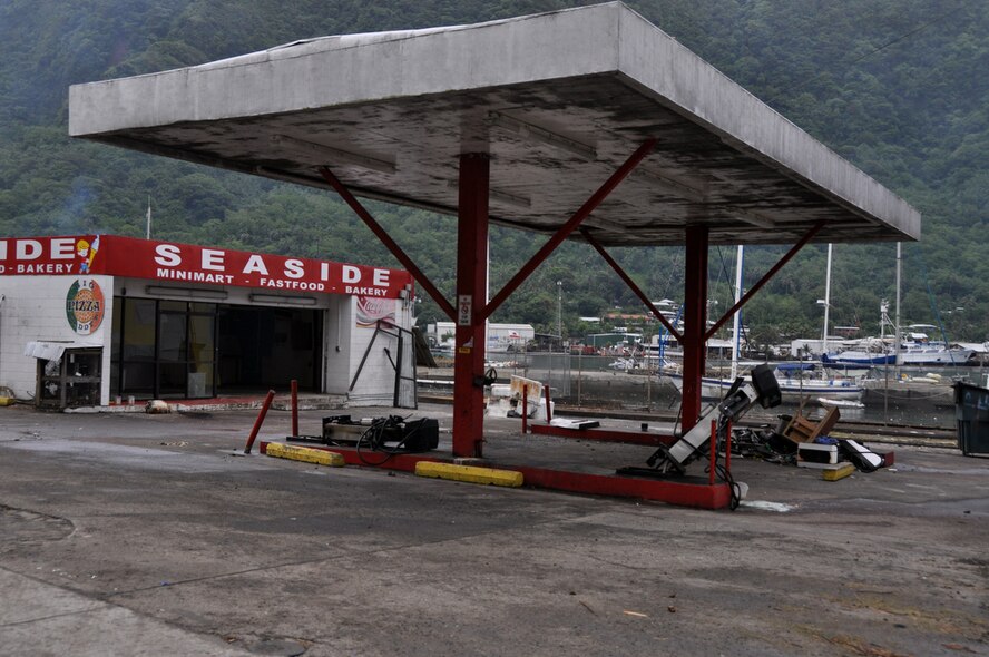 PAGO PAGO - The Seaside Gas Station sits near the shoreline of the Pago Pago Harbor area after being damaged by a tsuanami that hit American Samoa on Sept. 29, 2009. The tsuanmi caused a lot of structural and power damage, which cased many to be displaced. (U.S.  Air Force photo/Tech Sgt. Cohen A. Young)