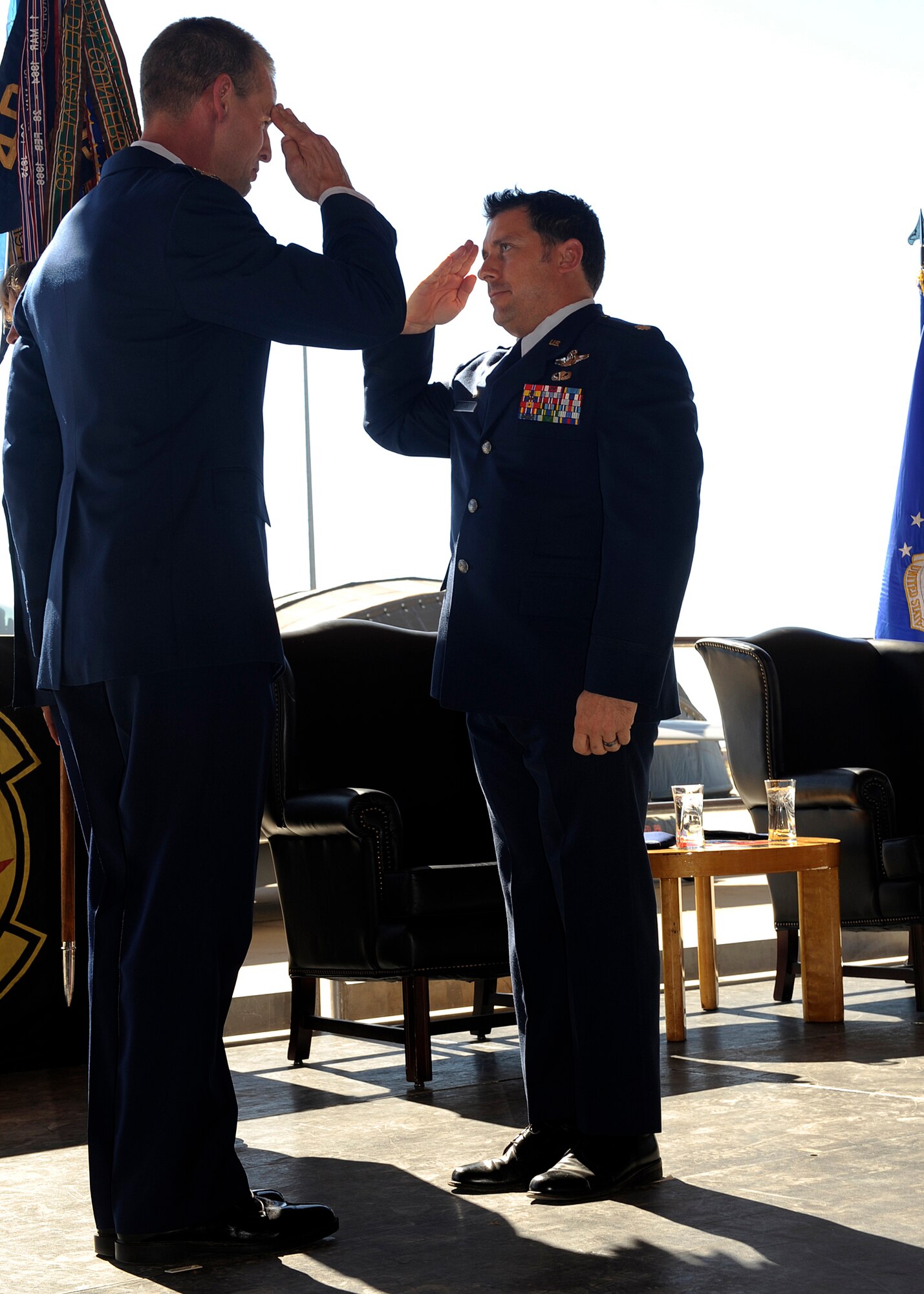 HOLLOMAN AIR FORCE BASE, N.M. -- Lt. Col. Craig Baker, 8th Fighter Squadron commander, salutes Col. Michael Stapleton, 49th Operations Group commander, after assuming the command of the 8th FS in a ceremony here Sept. 25. The 8th FS has a rich history beginning with its activation 1941. It was one of the original fighter squadrons assigned to the 49th Pursuit Group. Shortly thereafter, while performing its combat role in World War II, it acquired the title "The Black Sheep," a nickname widely used today. Previously, the 8 FS flew such diverse aircraft as the F-15, F-4, F-80, P-51 and P-38. Capt. John Fischer, one of the first pilots to be assigned to the reactivated 8th FS, said he is "excited to carry on the history and traditions of the 8th FS." (U.S. Air Force photo by Senior Airman Tiffany Trojca)