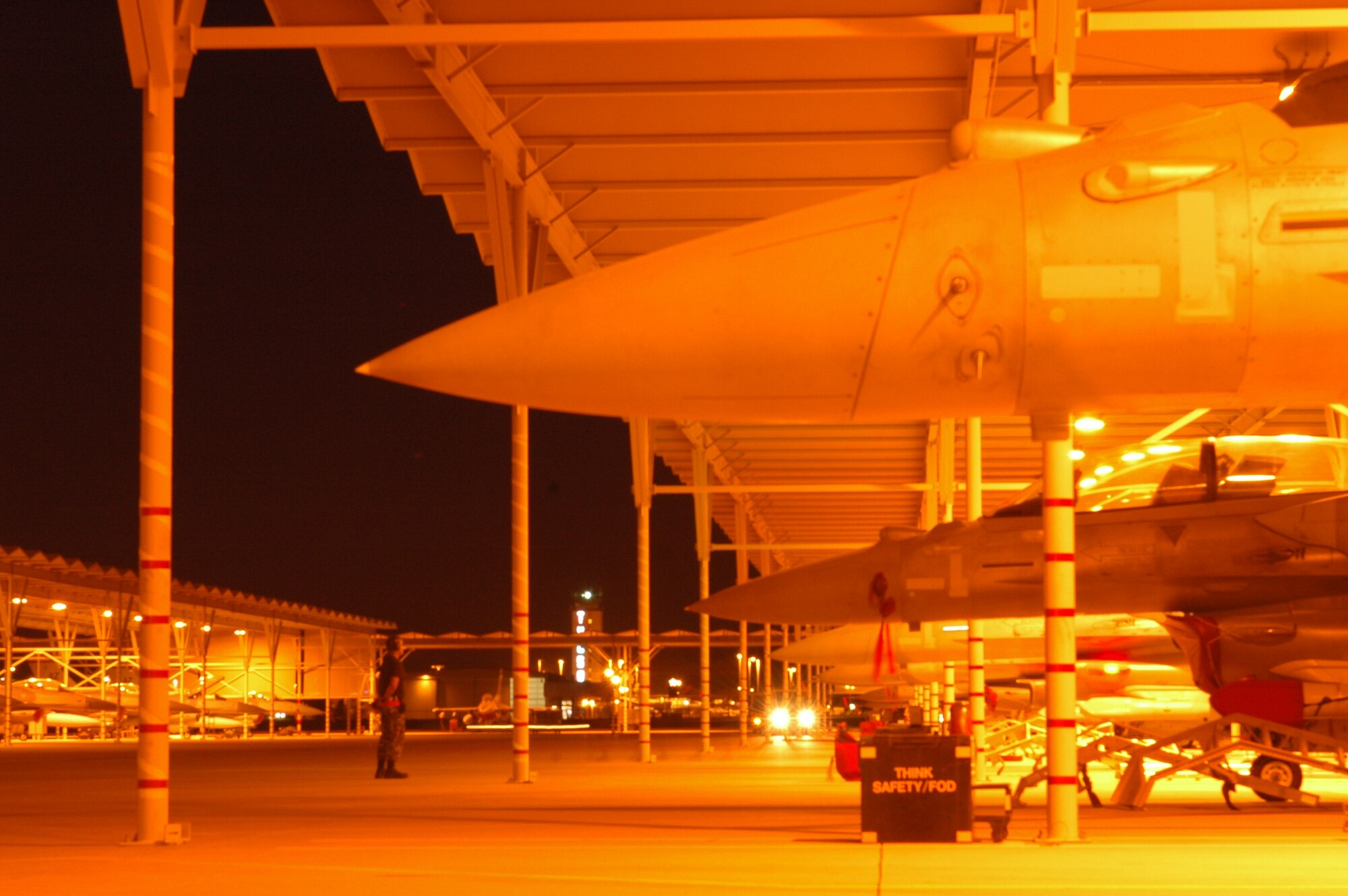 The 162nd Fighter Wing flightline buzzes with activity during a “night week” when pilots practice flying with night vision goggles. (Air National Guard photo by Maj. Gabe Johnson)