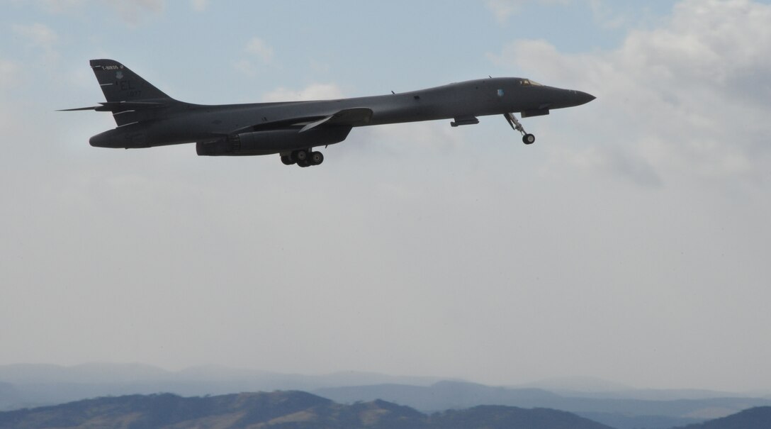 A B-1B Lancer from the 34th Bomb Squadron takes off with the attached Sniper pod here, October 1.  The Sniper pod is an advanced targeting pod with a multi-sensor system that increases the aircraft's self-targeting capability. (U.S. Air Force photo/Airman 1st Class Anthony Sanchelli)
