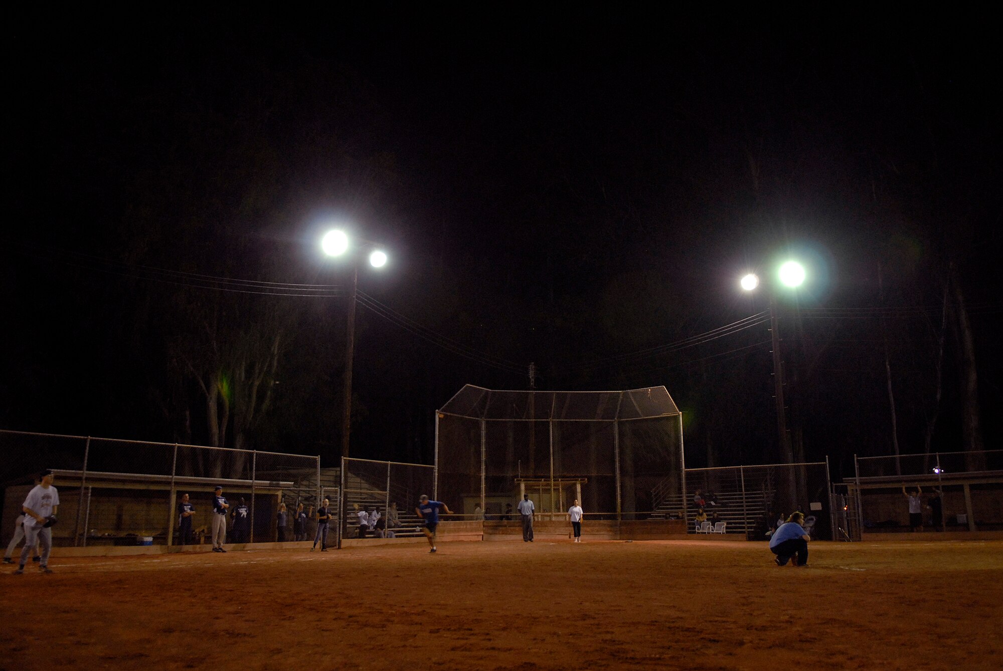 VANDENBERG AIR FORCE BASE, Calif. -- Airmen on base, play out their last game of the week during an intramural softball game between the 532nd Training Squadron and the 392nd Training Squadron here Sep. 28.  The 532nd TRS won the close game 12-10. (U.S. Air Force photo/Senior Airman Andrew Satran)