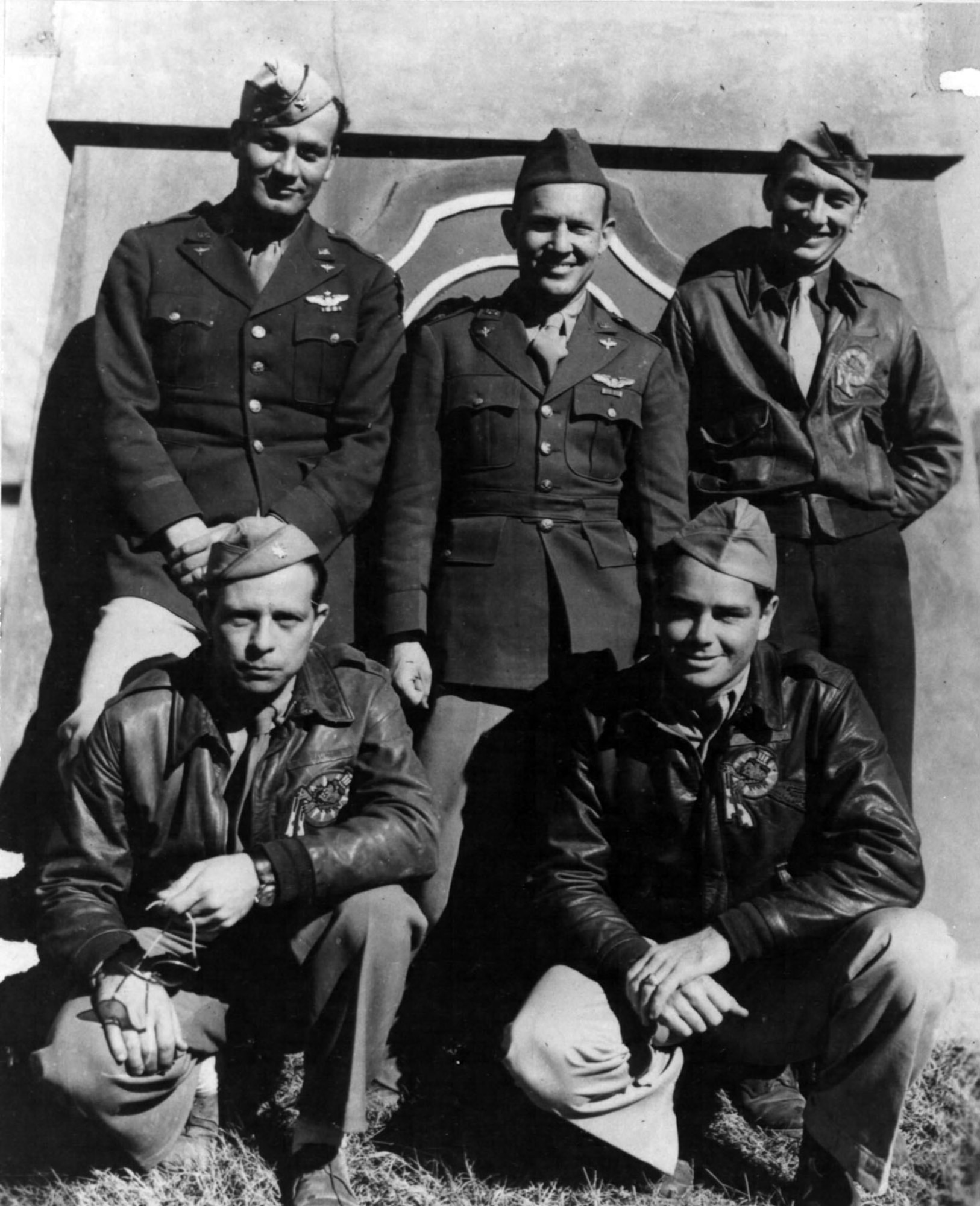 Top row, from left: Col. Clinton D. "Casey" Vincent, Lt. Col. John R. Alison (commander of the 75th Fighter Squadron), and Col. Bruce K. Holloway (commander of the 23rd Fighter Group, and later commander of the Strategic Air Command). Foreground, from left: Lt. Col. Albert T. "Ajax" Baumler  and Lt. Col. Grattan "Grant" Mahony (commander of the 76th Fighter Squadron) in China (1943). (U.S. Air Force photo)