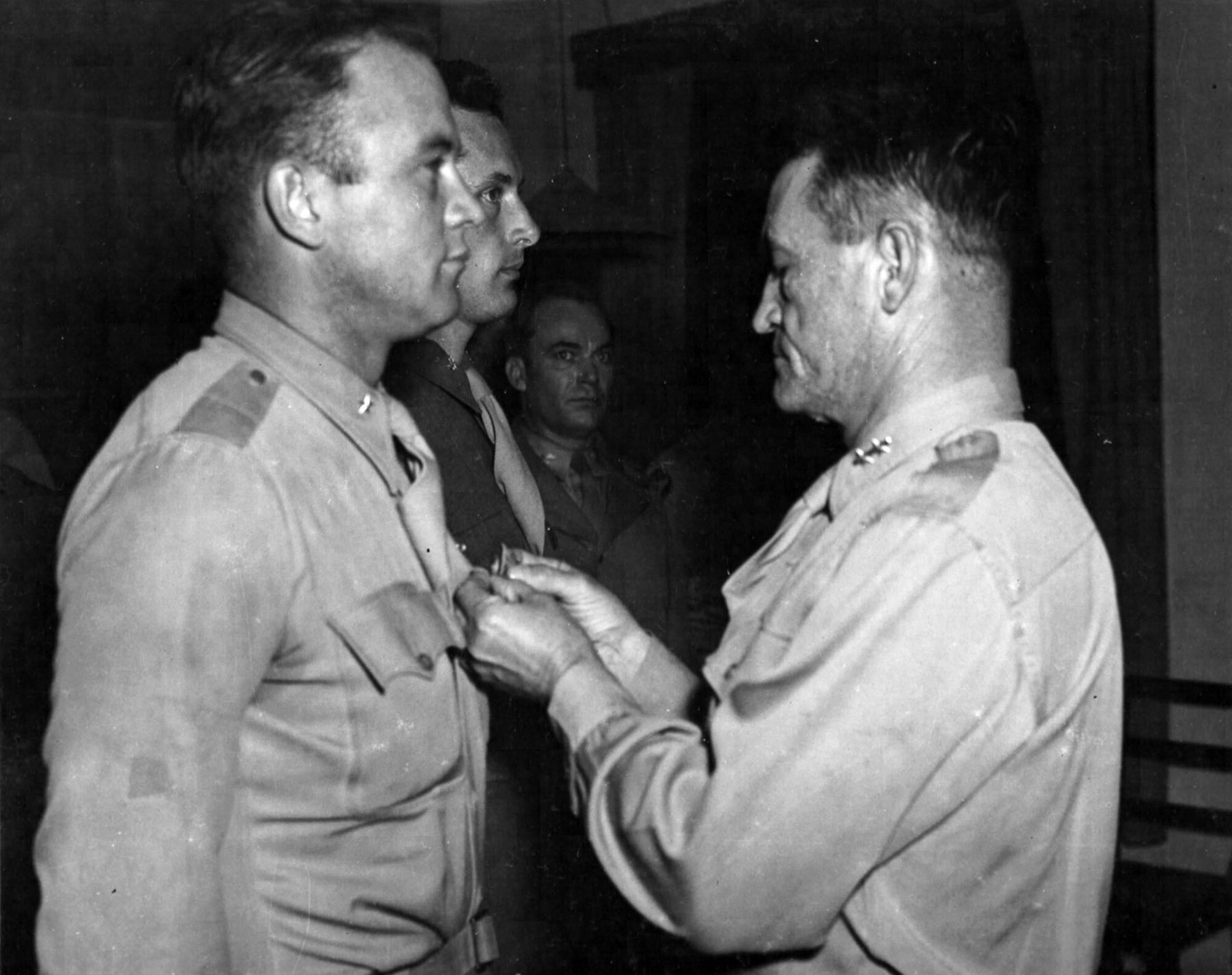 Brig. Gen. Clinton D. "Casey" Vincent receives an Oak Leaf Cluster to his Air Medal from Maj. Gen. Claire L. Chennault, commander of the 14th Air Force, in December 1944. (U.S. Air Force photo)