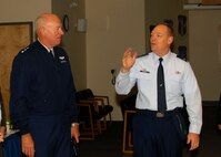 Lt. Gen. Harry M. Wyatt III, Director of the Air National Guard is introduced by Col. Kevin W. Bradley, 174th Fighter Wing Commander to the assembled commanders at Hancock Field Air National Guard Base in Syracuse N.Y. on 2 October 2009. Lt. Gen. Wyatt visited the base for the grand opening of the new MQ-9 Reaper Maintenance Field Training Detachment. (US Air Force photo by Staff Sgt. Ricky J Best/ RELEASED)