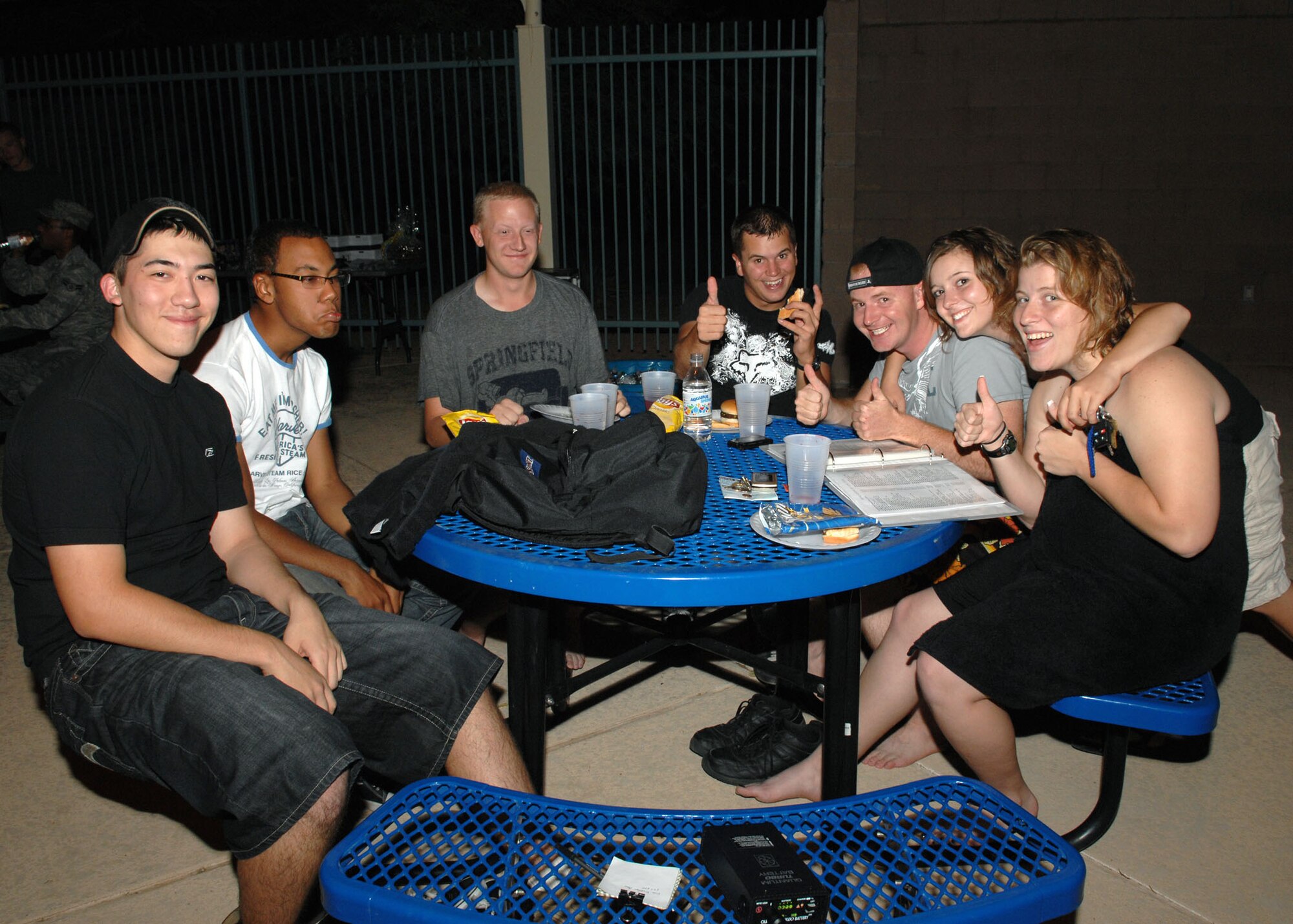 Airman attending the Summer Splash 2009 event socialize at the outdoor pool here Sept. 25. The event, which attracted more than 75 Airmen, was sponsored by the Culture of Responsible Choices, and marked the end of the summer season and the closing of the outdoor pool. CoRC is a program that emphasizes personal responsibility and accountability for decision-making and behavior on and off duty,  (U.S. Air Force photo/Airman Jerilyn Quintanilla)