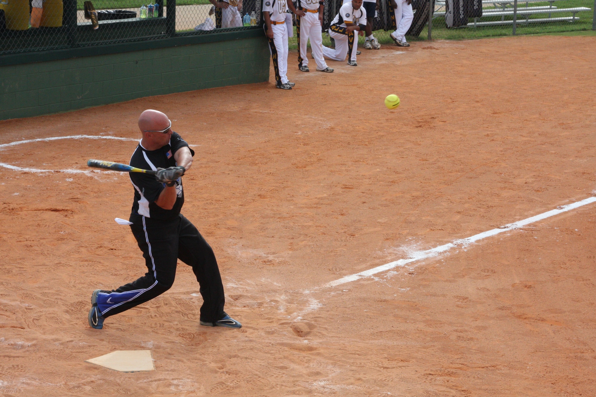 Master Sgt. Daniel Simpson steps up to the plate for the men's Air Force softball team. The Air Force team won the gold medal at the Armed Forces Slow-Pitch Softball Championships. (Photo courtesy of Steve Brown)