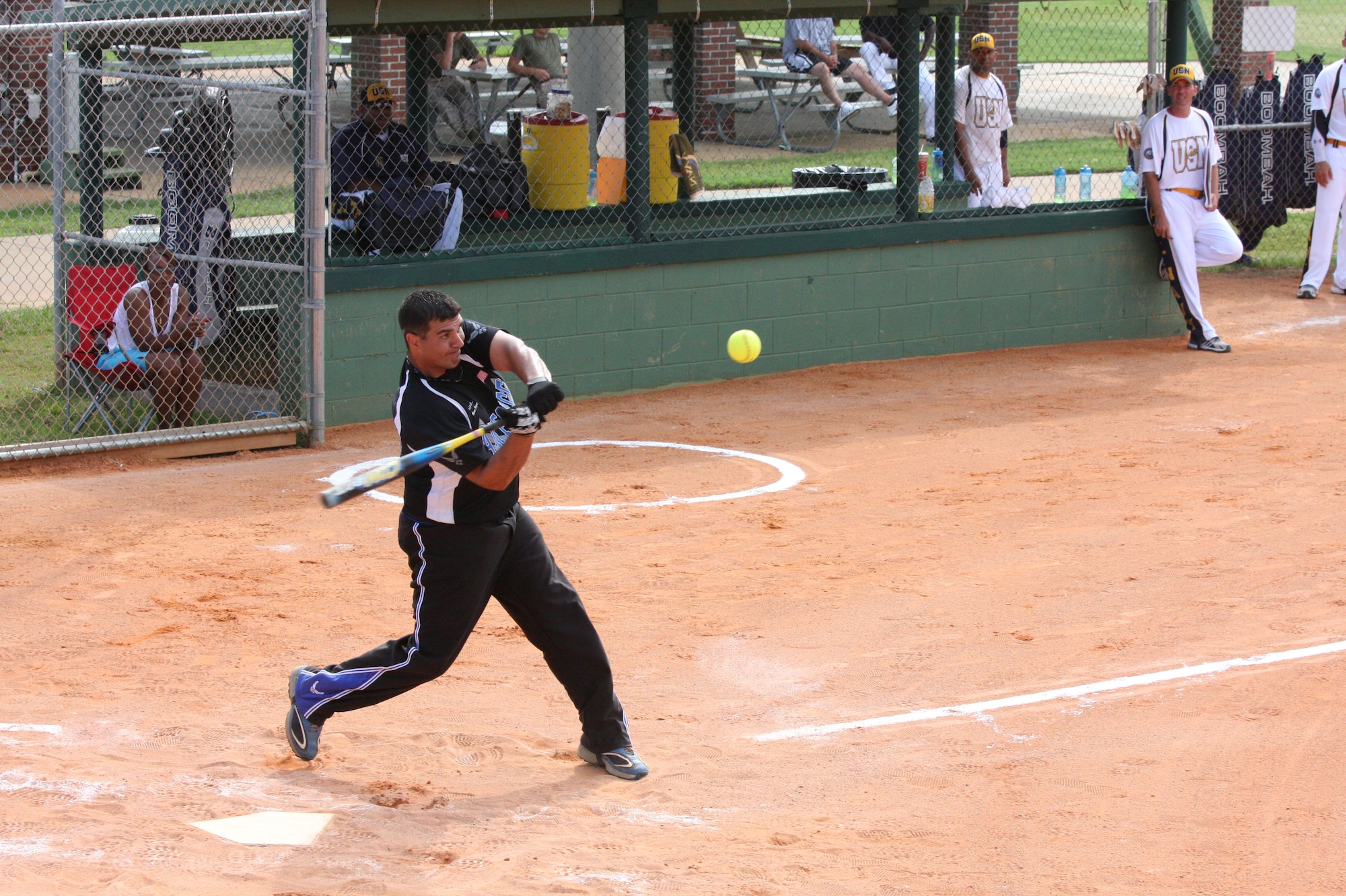 Capt. Bill Mamourieh takes a swing for the men's Air Force softball team. The Air Force team won the gold medal at the Armed Forces Slow-Pitch Softball Championships. (Photo courtesy of Steve Brown)