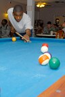 Airmen from the 42nd Air Base Wing members enjoy a game of pool during the 42nd ABW Wingman and Safety Day Sept. 25. The day began with a 5k run at 6 a.m. and continued with various team building events throughout the day. (U.S. Air Force photo/Jamie Pitcher)