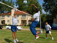 42nd Air Base Wing members enjoy a volleyball game during the 42nd ABW Wingman and Safety Day Sept. 25. The day began with a 5k run at 6 a.m. and continued with various team building events throughout the day. (U.S. Air Force photo/Jamie Pitcher)