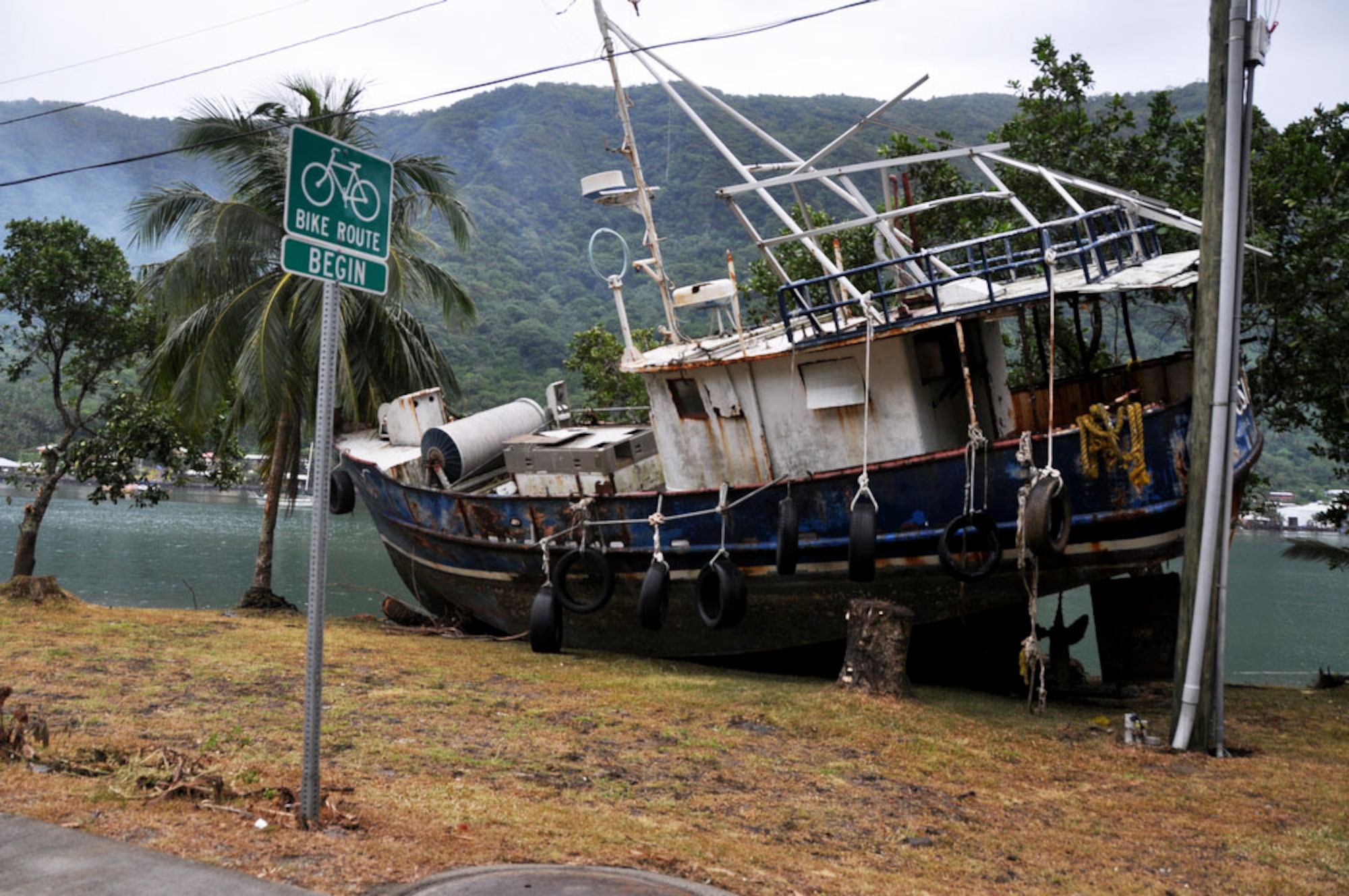 A boat sits upon land after a tsunami carried many items inland Oct. 1, 2009, in Pago Pago, American Samoa. The island nation was struck Sept. 29 by an 8.3 magnitude earthquake generating 15-foot waves and destroying whole villages. (U.S. Air Force photo/Tech. Sgt. Cohen A. Young)
