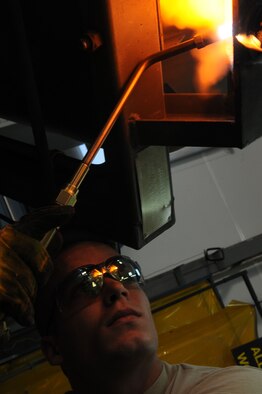 Senior Airman Justin Elledge, 39th Maintenance Squadron aircraft metals technician, uses a blow-torch to weld a broken seal Tuesday, Sept. 29, 2009 at the Incirlik Air Base fabrications shop. The fabrications shop is comprised of two sheet metal and two metals technicians, housed under one roof in support of a wide-range of aircraft and equipment, 24-hours a day, seven days a week. (U.S. Air Force photo/Senior Airman Erica Picariello)