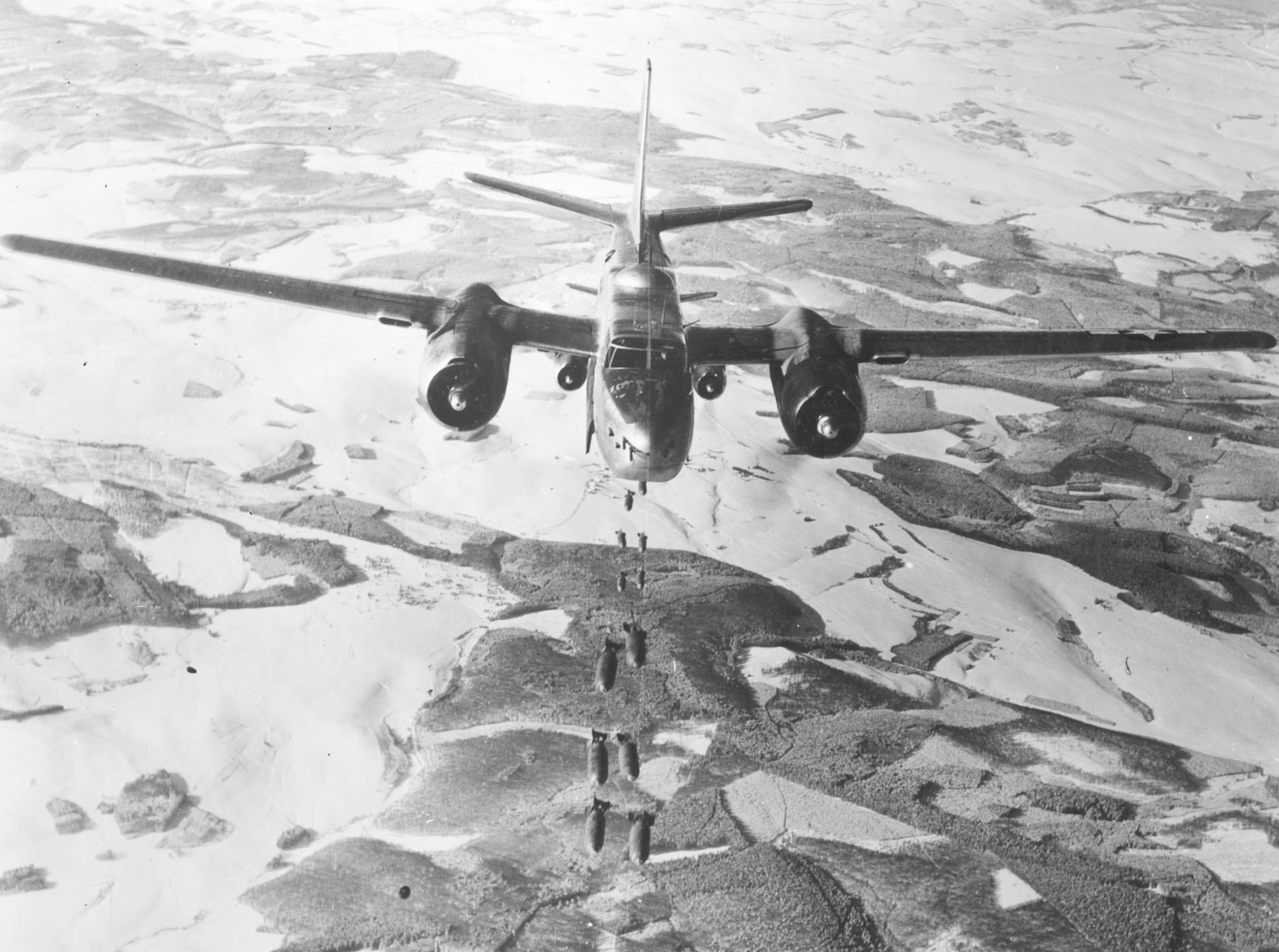 A-26 Invader attack aircraft dropping bombs on the Siegfried Line. (U.S. Air Force photo)