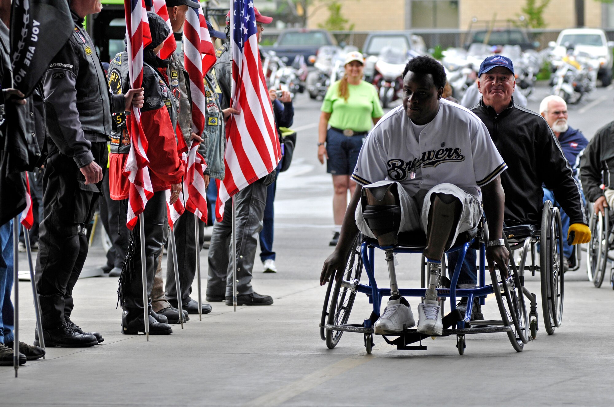Athletes participating in the 29th National Veterans Wheelchair Games (NVWG) are greeted by the Washington Patriot Guard in preparation for the game’s opening ceremony. First held in 1981, the even has grown to include more than 500 athletes competing in 17 different events. The games are being held here in Spokane, WA from the 13 - 18th of July, 2009. (U.S. Air Force photo by Staff Sgt Anthony Ennamorato)