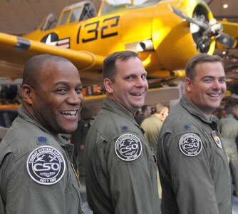 The three squadron commanders of the 479th Flying Training Group stand together Oct. 1 in the National Museum of Naval Aviation at NAS Pensacola, Fla. They are (left to right) Lt. Col. Mike Love, 455th Flying Training Squadron, Lt. Col. Ray Chuvala, 479th Operations Support Squadron, and Lt. Col. Jeff Burdett, 451st Flying Training Squadron. (U.S. Air Force photo by Joel Martinez)