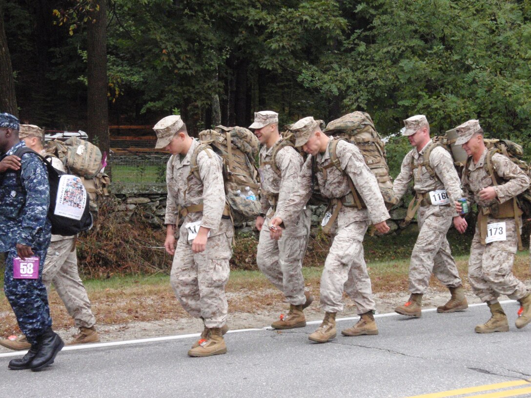 Marines from Company B, 3rd Light Armored Reconnaissance Battalion, close in on mile 17 of the Maine Marathon Tribute March Oct. 4 in Portland, Maine.