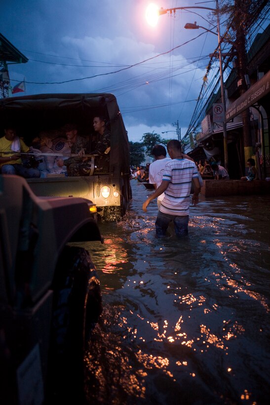 Exercise Sagip, which translates to English roughly as Exercise 'Lend Assistance,' tested American and Philippine military planners in navigating the Philippine Disaster Management System. When American and Philippine forces respond to a natural disaster or mass casualty event in the western Pacific region, like the humanitarian support to last year's flood victims in the Philippines pictured here, these allies will better understand the language of civilian disaster relief agencies and each others' management process because of exercises like Sagip. In this photo, III Marine Expeditionary Force Marines and members of the Armed Forces of the Philippines deliver relief supplies in Manila, Republic of the Philippines, in the aftermath of the storms that flooded areas of the country Sept. 26 and Oct. 3.