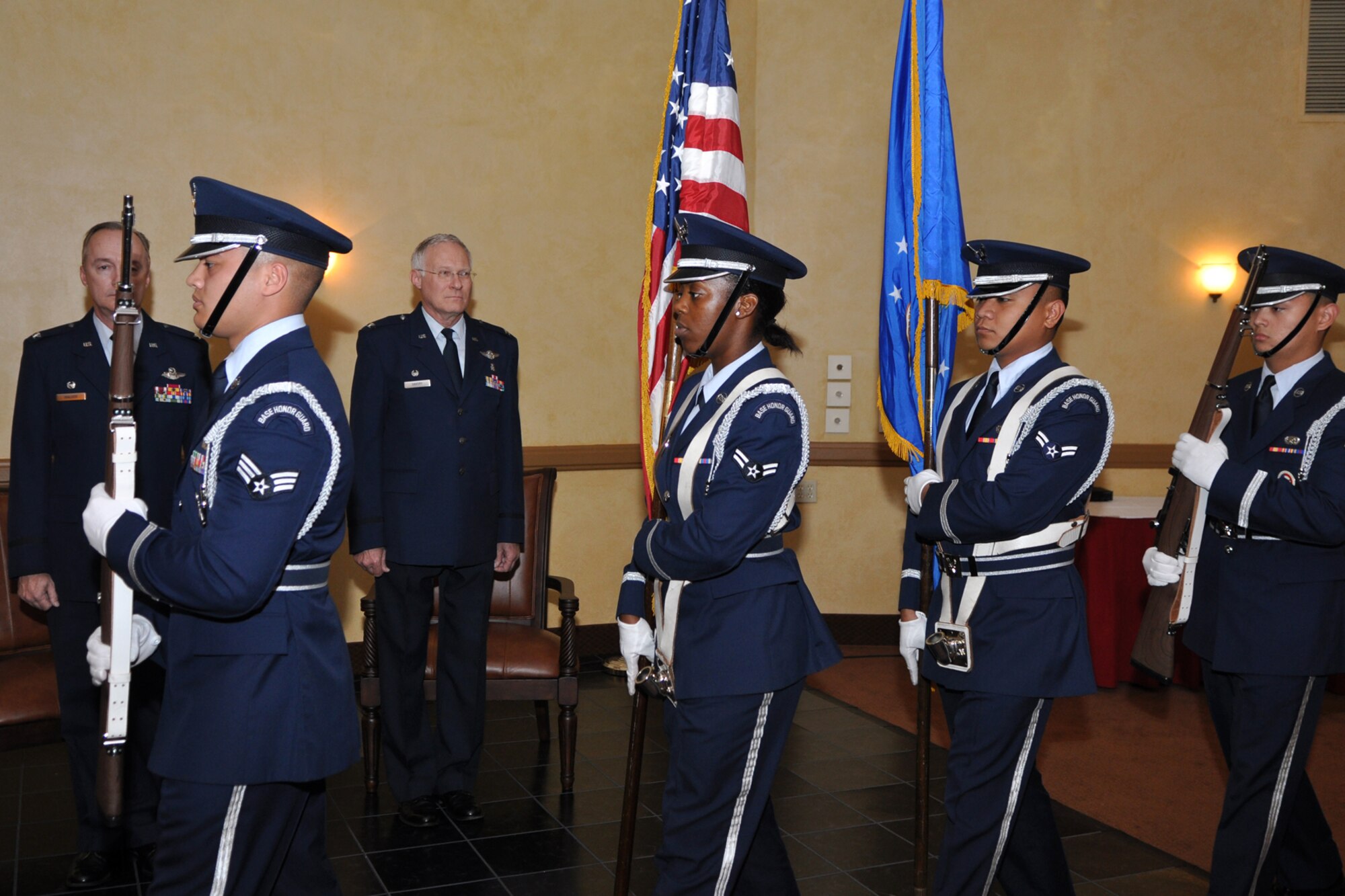 Members of the Barksdale Base Honor Guard post the colors during a retirement ceremony at Barksdale Air Force Base, La., October 3, 2009. Colonel Edmund Walker, 917th Wing, commander, presided over the ceremony which marked the end of the military career of Colonel Savory, as he was finally shoved out the door to the ranks of the retired after more than 32 years of honorable military service to his country and community. Until his retirement, Colonel Savory had been the Medical Director for the 917th Wing since 1999. (U.S. Air Force photo/Tech. Sgt. Jeff Walston)
