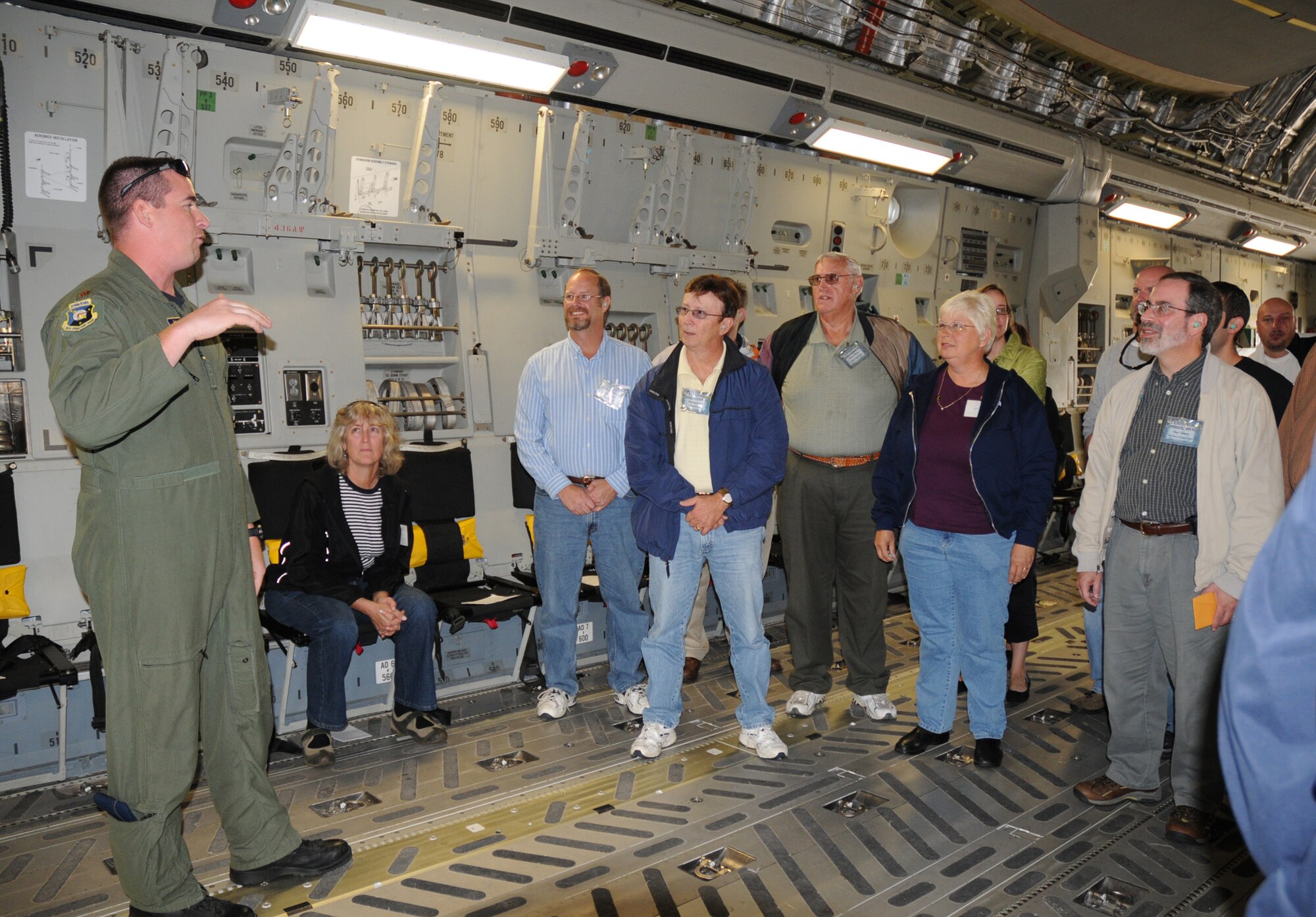 Maj. Mark Chagaris, 512th Operations Group, goes over the specifics of a C-17 Globemaster III flight that nearly 25 employers of 512th Airlift Wing reservsists took part in during Employer Appreciation Day, Oct. 3, here. (U.S. Air Force photo/Staff Sgt. Steve Lewis) 