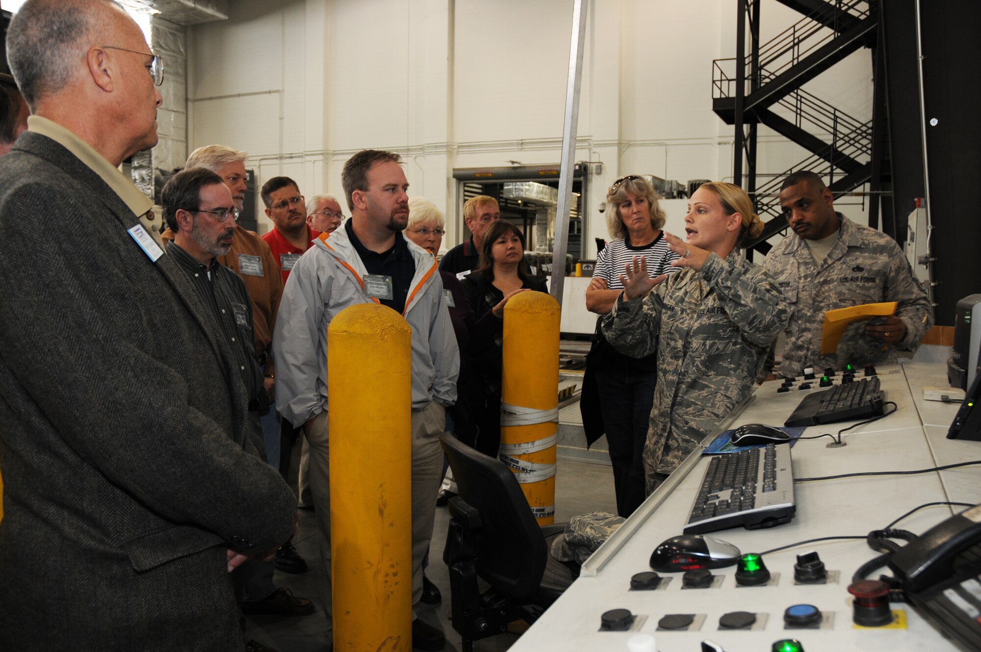 TSgt. Destiny Donigan, 46th Aerial Port Squadron, talks about the functions of cargo processing to nearly 25 employers of 512th Airlift Wing reservists during Employer Appreciation Day, Oct. 3, here. Employers spent the day learning more about the wing's mission, touring the base and partipating in a C-17 Globemaster III flight. (U.S. Air Force photo/Staff Sgt. Steve Lewis) 