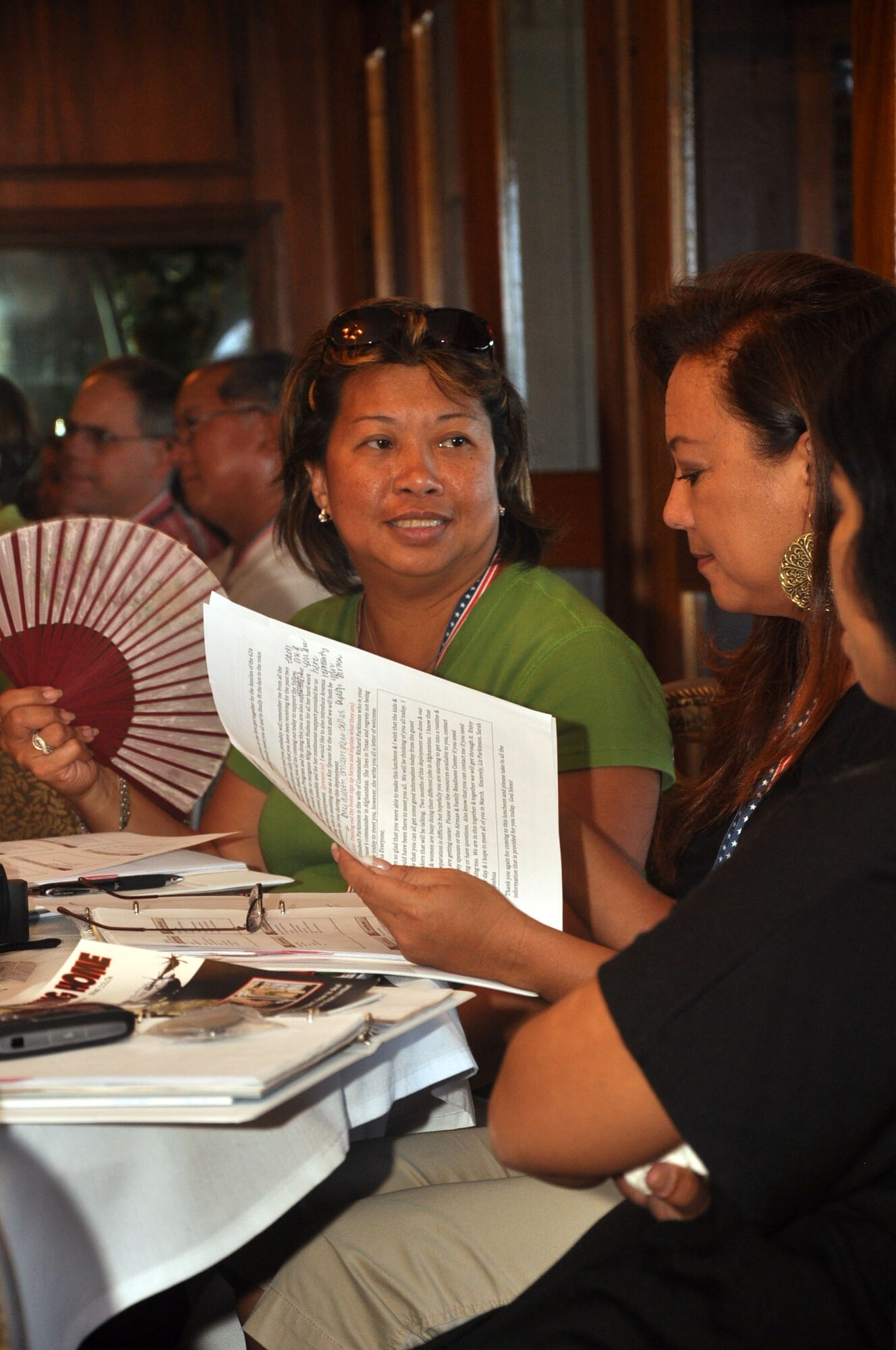 Aresina Belong and Donna Torres, 624th Civil Engineer Squadron key spouses, participate in the 624th RSG Airman and Family Readiness Center Yellow Ribbon Reintegration Program mid-deployment event held Sept. 27, Hickam Air Force Base, Hawaii. (U.S. Air Force photo/Master Sgt. Daniel Nathaniel)