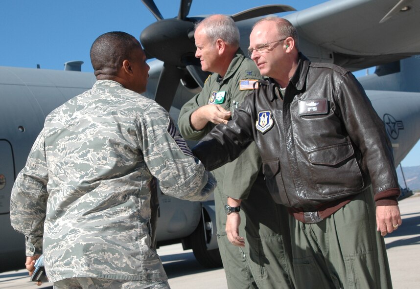 Chief Master Sgt. Anthony Brinkley (left) greets Col. Kurt Jones during a 19th Airlift Wing Community Relations Tour Oct. 2 at Peterson Air Force Base, Colo. Chief Brinkley was joined by Little Rock-area civic leaders who lend their community support to Little Rock AFB, Ark. At Peterson, the group visited the 302nd AW to gain a better perspective on how the Air Force Reserve and its Active Duty counterparts work together. Colonel Jones is the 302nd Operations Group commander; Chief Brinkley is the 19th AW command chief. (U.S. Air Force photo/Staff Sgt. Stephen J. Collier)