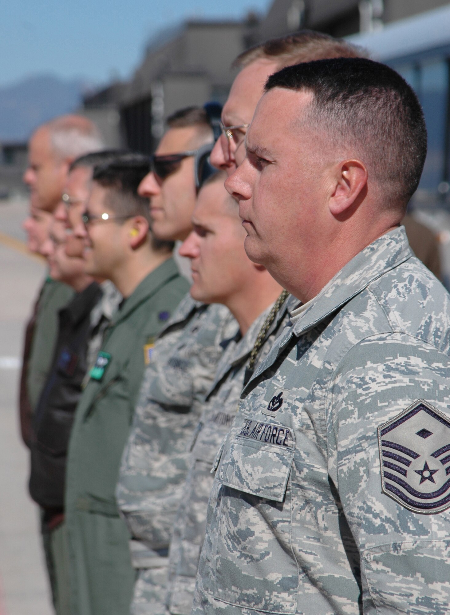 Master Sgt. Chris Vossmer (foreground) and an official party from the 302nd Airlift Wing welcomes civic leaders from Little Rock Air Force Base, Ark., during a 19th Airlift Wing Community Relations Tour Oct. 2 at Peterson Air Force Base, Colo. The Little Rock, Ark.-area civic leaders, who lend their community support to Little Rock AFB, visited the 302nd AW to gain a better perspective on how the Air Force Reserve and its Active Duty counterparts work together. Sergeant Vossmer is the 52nd Airlift Squadron first sergeant. (U.S. Air Force photo/Staff Sgt. Stephen J. Collier)