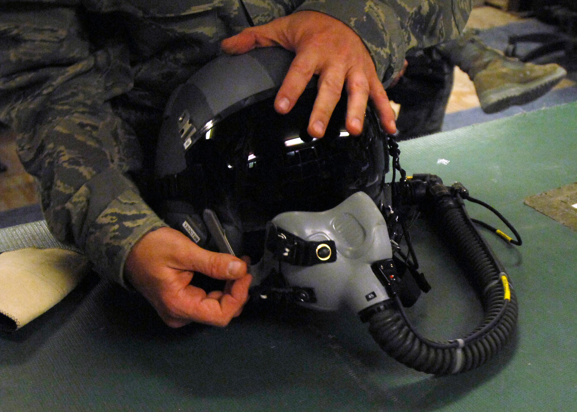 Airmen cleaning flight equipment > U.S. Air Forces Central > Display