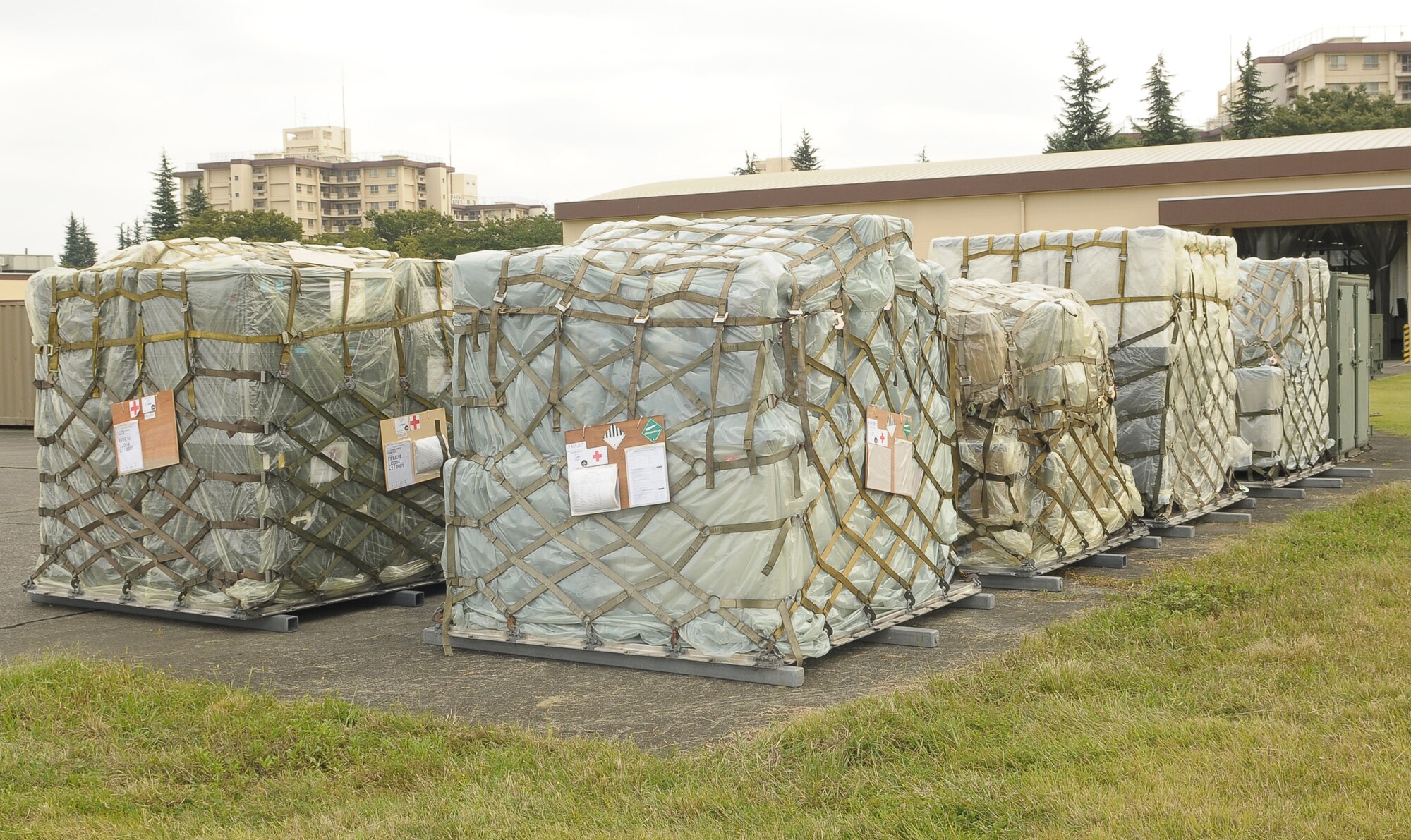 YOKOTA AIR BASE, Japan -- Medical support squadron personnel from the 374th Medical Group here built nine pallets totaling more than 35,000 pounds of equipment Oct. 4 to support the deployment of a U.S. Air Force Humanitarian Assistance Rapid Response Team to Padang, Indonesia. The HARRT, which includes members from here and Andersen Air Force Base, Guam, is scheduled to depart Oct. 5 aboard a C-17 Globemaster III. (U.S. Air Force photo/Airman 1st Class Sean Martin)