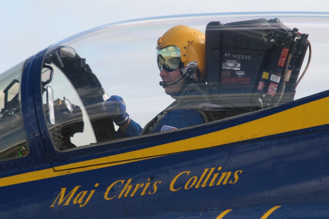 Maj. Chris Collins, a pilot with the U.S. Navy’s Flight Demonstration Squadron, The Blue Angels, taxi’s down the air station flight line before the last show of the 2009 MCAS Miramar Air Show, Oct. 4. Collins served aboard the air station as a pilot with Marine Fighter Attack Squadron 323, and an instructor pilot with Marine Fighter Attack Training Squadron 101 before joining the Blue Angels.::r::::n::(Official U.S. Marine Corps photo by Cpl. Christopher O’Quin)(Released)::r::::n::