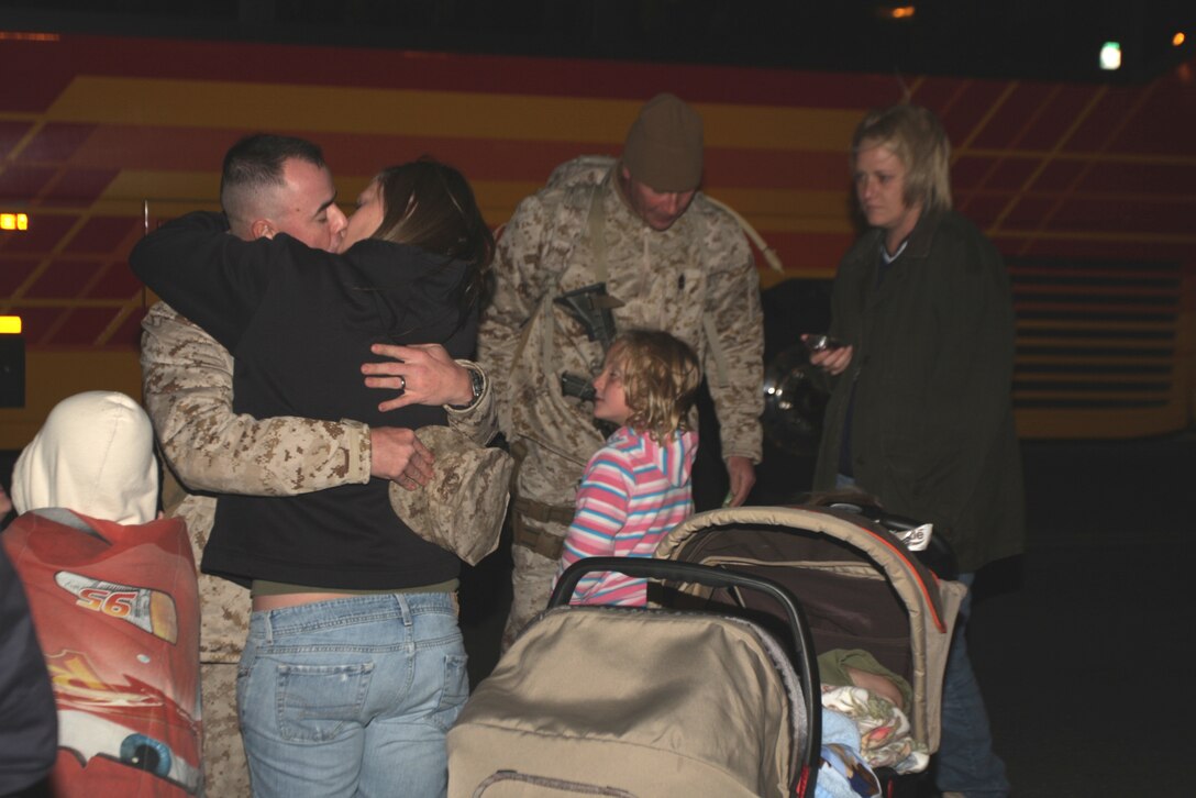 Marines from Company I, 3rd Battalion, 4th Marine Regiment, say goodbye to their families at Victory Field before leaving for Afghanistan Oct. 5. While deployed, the battalion will be responsible for maintaining security in the country as well as helping to build infrastructure for the local populous.