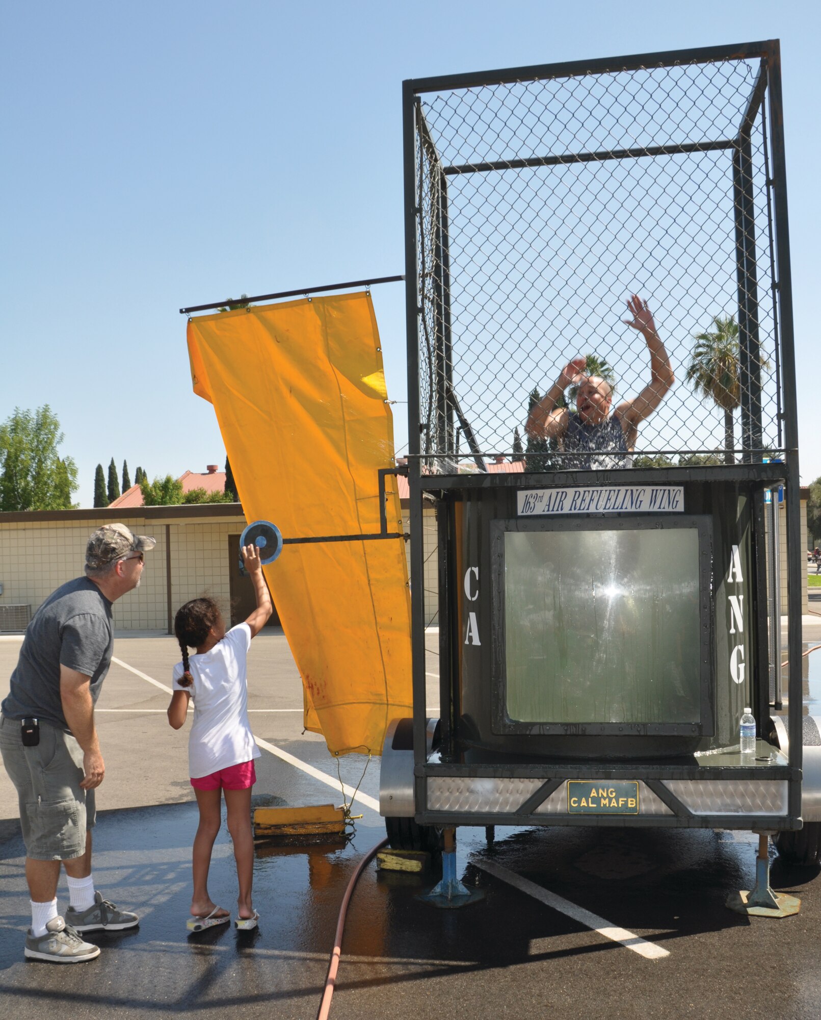 Fun in the dunk tank. (U.S. Air Force photo by Capt Ashley Norris)