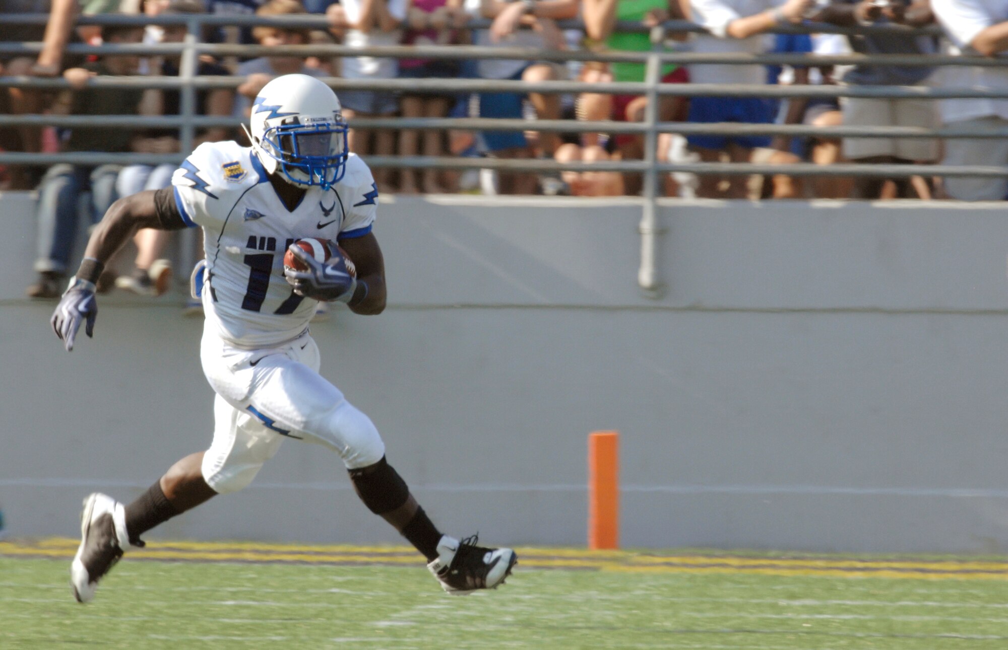 U.S. Air Force Academy running back Asher Clark runs the ball against the U.S. Naval Academy defense Oct. 3, 2009, at Navy-Marine Corps Memorial Stadium in Annapolis, Md. The Midshipmen won the game 16-13, with a field goal in overtime. (U.S. Air Force photo/Staff Sgt. Tim Chacon)