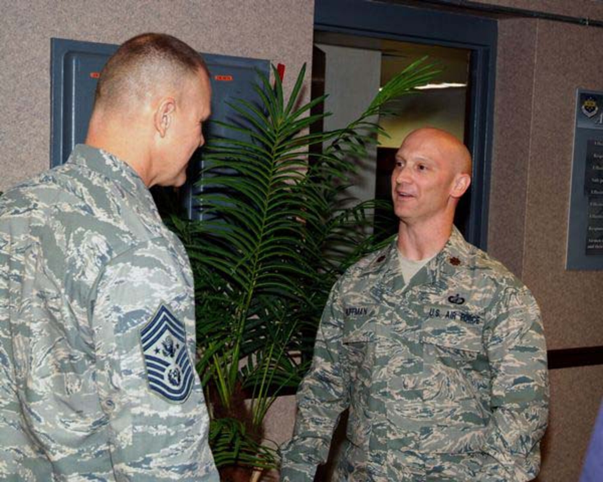 HURLBURT AIR FORCE BASE, Fla. -- Chief Master Sergeant of the Air Force James Roy talks with Maj. Daniel Huffman, 505th Command and Control Wing comptroller, after breakfast with the Wing on Sept. 23. Major Huffman and Chief Roy served together at Columbus and Langley Air Force bases and have known each other for about ten years. (U.S. Air Force photo/Keith Keel) 