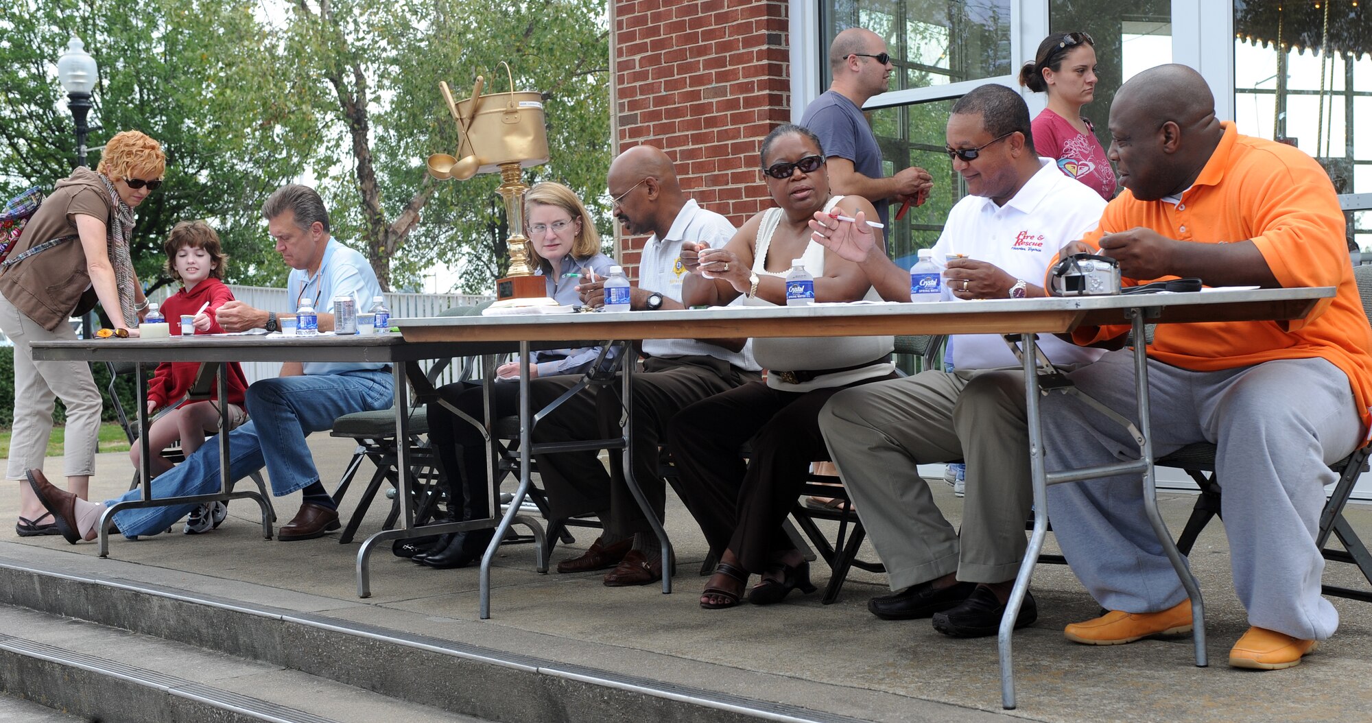 LANGLEY AIR FORCE BASE, Va. -- Judges taste chili in order to determine the best during the annual Hampton Division Fire and Rescue Chili Cook-off in downtown Hampton Oct. 3. The cook-off helped raise money for Hampton City fire prevention, which helps the community by installing free smoke detectors and raising awareness of fire prevention.  (U.S. Air Force photo/Senior Airman Zachary Wolf)

