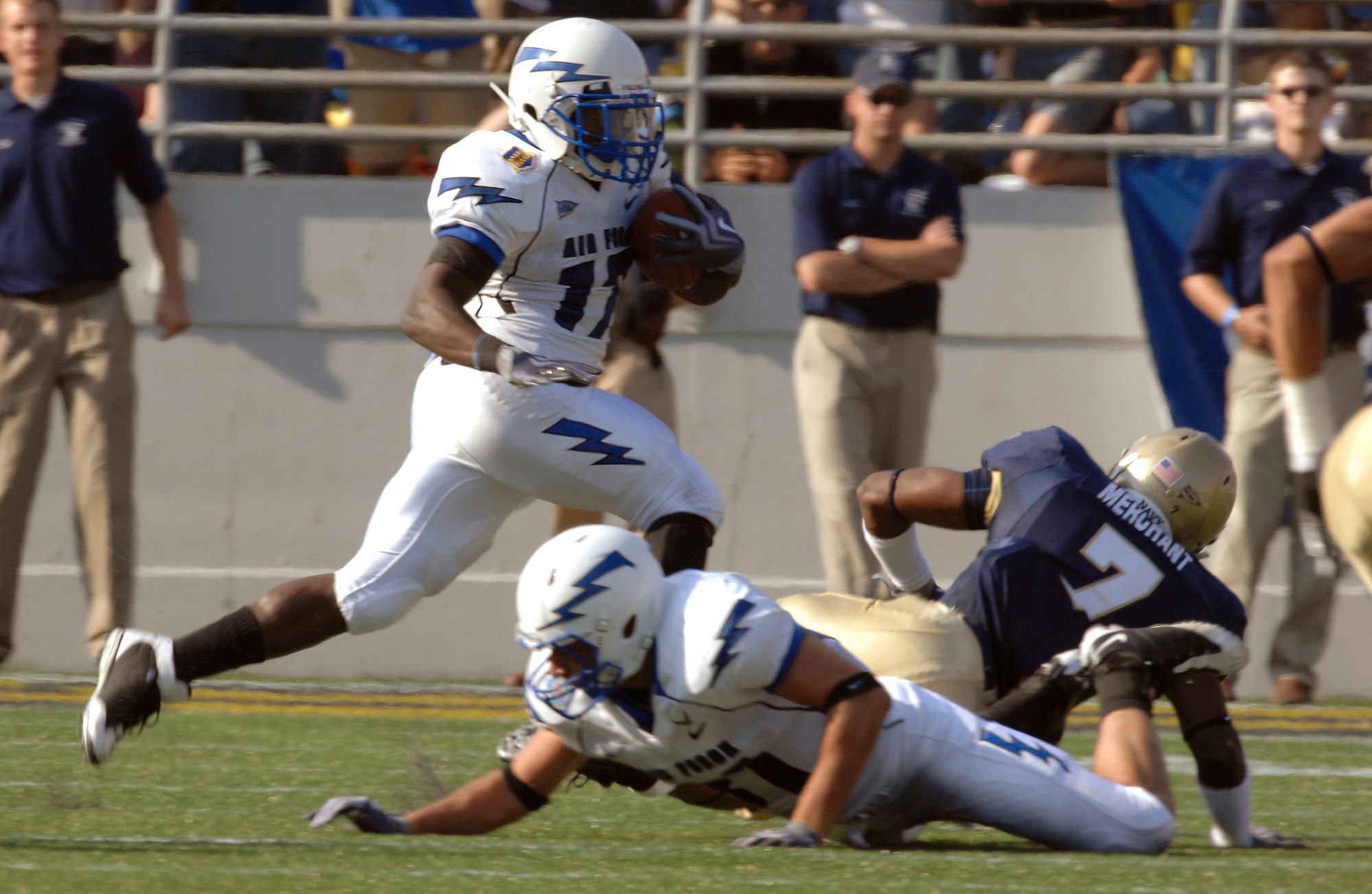 Falcons running back Asher Clark runs the ball against Navy Oct. 3, 2009 at Navy-Marine Corps Memorial Stadium in Annapolis, Md. The Midshipmen won 16-13 with a field goal in overtime. Navy has won the past seven matchups between the two schools, but the Air Force leads the overall series 25-17. (U.S. Air Force photo/Staff Sgt. Tim Chacon)