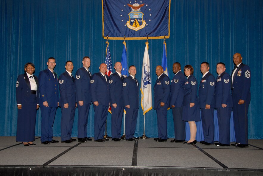 McGHEE TYSON AIR NATIONAL GUARD BASE, Tenn. -- The commandant of the Paul H. Lankford Enlisted Professional Military Education Center and the students of NCO Academy Class 09-6, C-Flight, gather after receiving their diplomas during the class graduation ceremony at Wilson Hall here, Sept. 30, 2009.  Pictured from L-R are Chief Master Sgt. Deborah Davidson, commandant, Petty Officer 1st Class Dominick J. Nasuto, Tech. Sgt. Mario M. Burciaga, Tech. Sgt. Jeffrey P. Burke, Tech. Sgt. Justin R. Funk, Tech. Sgt. Joshua S. Hartman, Tech. Sgt. Robert J. Horacek, Tech. Sgt. Tera L. Johnson, Tech. Sgt. Craig D. Kirkland, Tech. Sgt. Andre L. Percell, Tech. Sgt. Culeen C. Shaffer, Tech. Sgt. Henry S. Wilson, Tech. Sgt. Jason R. Young, and Chief Master Sgt. Leroy Frink. (U.S. Air Force photo by Master Sgt. Kurt Skoglund)
