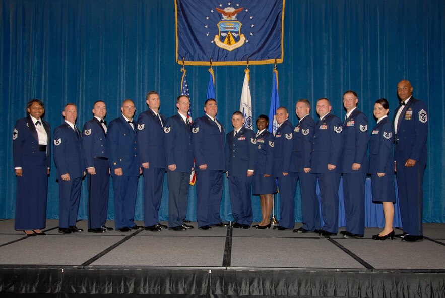 McGHEE TYSON AIR NATIONAL GUARD BASE, Tenn. -- The commandant of the Paul H. Lankford Enlisted Professional Military Education Center and the students of NCO Academy Class 09-6, A-Flight,  gather after receiving their diplomas during the class graduation ceremony at Wilson Hall here, Sept. 30, 2009.  Pictured from L-R are Chief Master Sgt. Deborah Davidson, commandant, Tech. Sgt. Patrick J. Narango, Tech. Sgt. Jonathan M. Bard, Petty Officer 1st Class Adam D. Barton, Tech. Sgt. Shawn R. Bergman, Tech. Sgt. Joseph W. Bishop, Tech. Sgt. Douglas S. Cole, Tech. Sgt. George F. Hoffman, Tech. Sgt. Jammie T. Jackson, Tech. Sgt.  Matthew R. Kennedy, Tech. Sgt. Michael D. Schiller, Tech. Sgt. Nathan J. Skoglund, Tech. Sgt. Carl T. Wiegel, Tech. Sgt. Alicia D. Wittke, and Chief Master Sgt. Leroy Frink. (U.S. Air Force photo by Master Sgt. Kurt Skoglund)