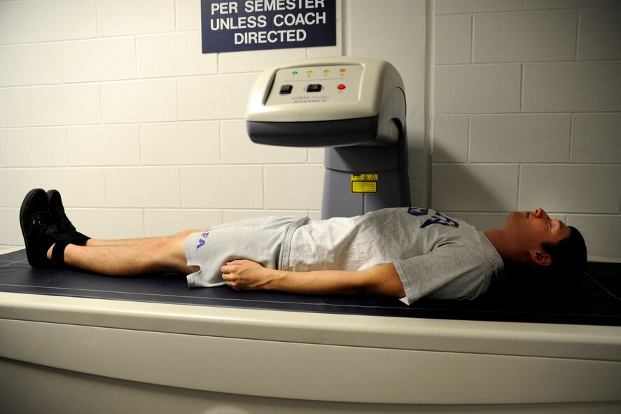 Cadet 3rd Class Jesse Bicknell, a member of the Air Force Academy Diving Team, gets a Dual Energy X-ray Absorptiometry scan to analyze his percentage of muscle to body fat and his bone density at the Academy's Human Performance Laboratory Sept. 28, 2009. Academy athletes take this scan about once a semester to track their progress. (U.S. Air Force photo/J. Rachel Spencer)