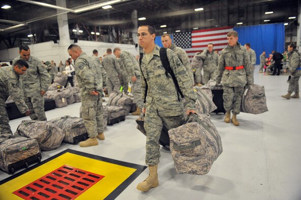 SHAW AIR FORCE BASE, S.C. -- Airmen of the 20th Fighter Wing get ready to depart on a four-month deployment to Afghanistan, Oct. 5. (U.S. Air Force photo/Senior Airman Kathrine McDowell)