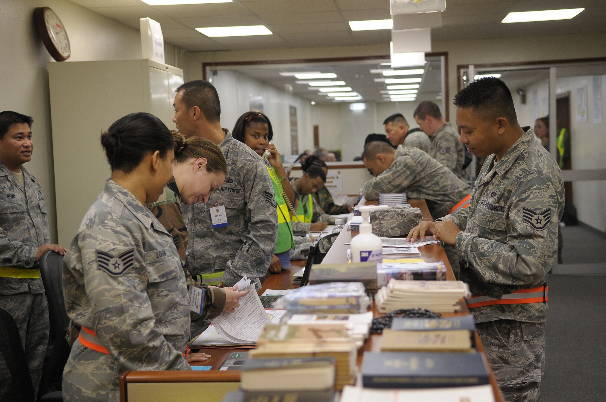 YOKOTA AIR BASE, Japan -- Airmen from the 374th Airlift Wing simulate the deployment process during Beverly-Bearcat 09-05, an operational readiness inspection conducte by the Pacific Air Forces Inspector General. (U.S. Air Force photo/Airman 1st Class Michael Dillon)