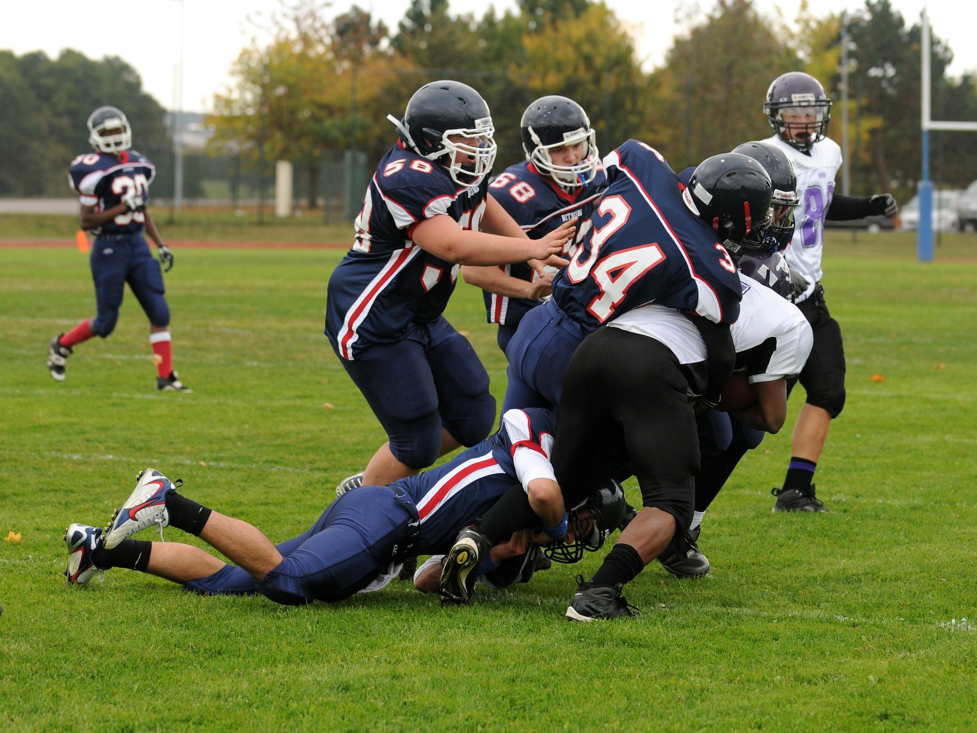 BITBURG ANNEX, Germany -- The Bitburg defense stops the Bison during a rush attempt during the second half Oct. 3 at Bitburg High School. The Bitburg Barons defeated the Mannheim Bison 35-0 during Bitburg’s homecoming game. (U.S. Air Force photo/Airman 1st Class Nathanael Callon)