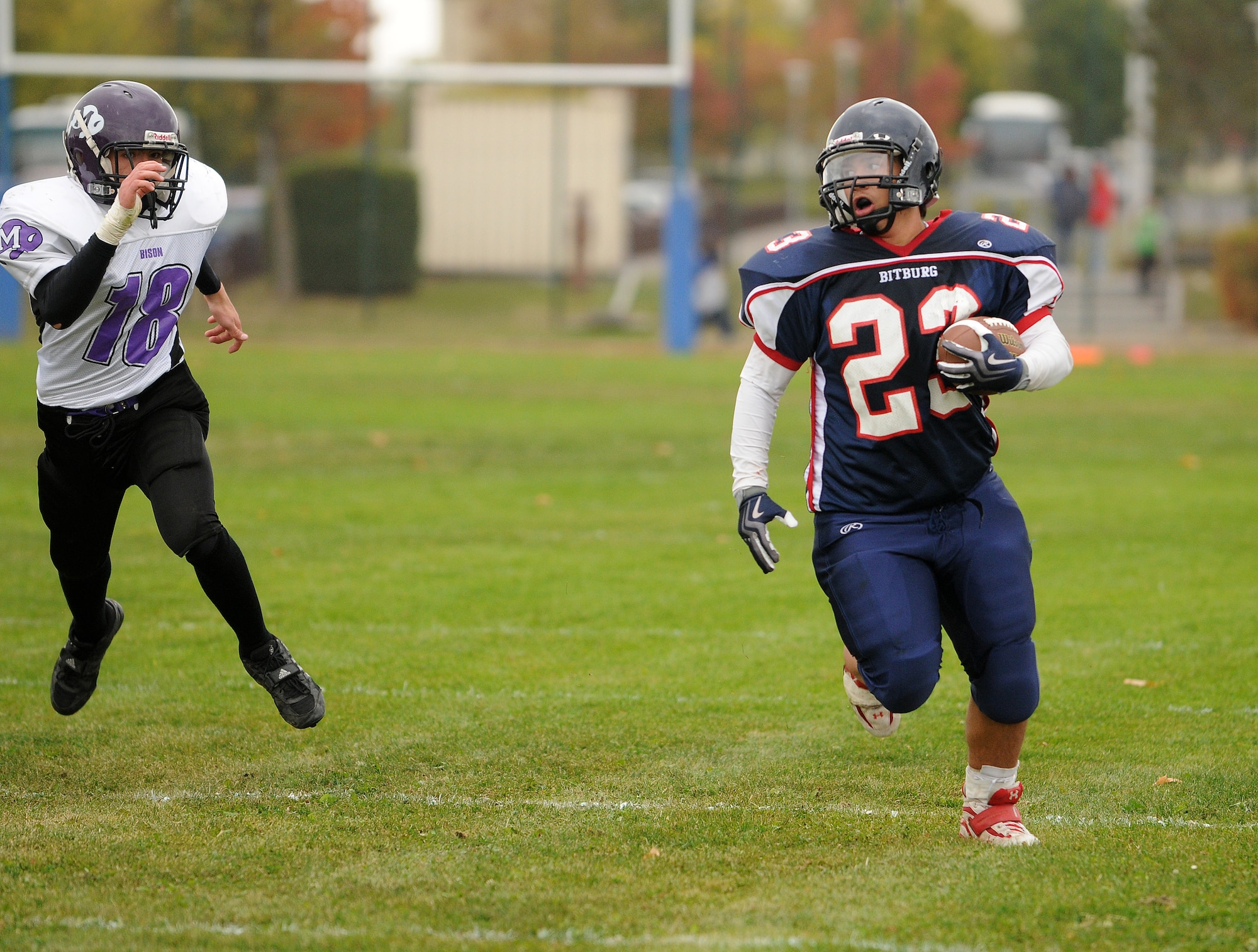 BITBURG ANNEX, Germany -- Bitburg running back Adam Garcia rushes for the end zone during the second half Oct. 3 during Bitburg High School’s homecoming game. The Bitburg Barons defeated the Mannheim Bison 35-0. (U.S. Air Force photo/Airman 1st Class Nathanael Callon)
