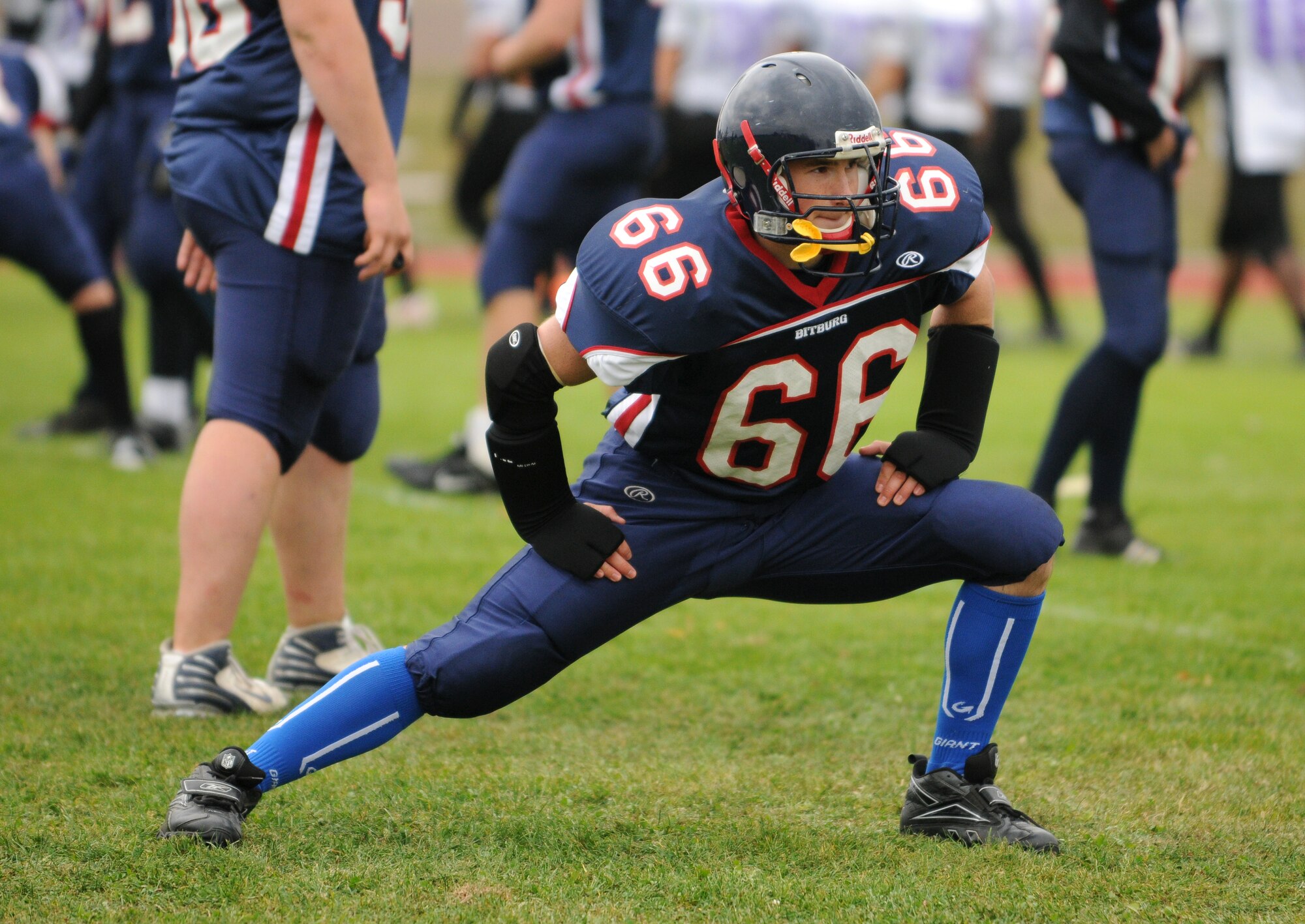 BITBURG ANNEX, Germany -- Bitburg lineman Michael Crane stretches before the second half of the Oct. 3 Bitburg High School homecoming game. The Bitburg Barons defeated the Mannheim Bison 35-0. (U.S. Air Force photo/Airman 1st Class Nathanael Callon)