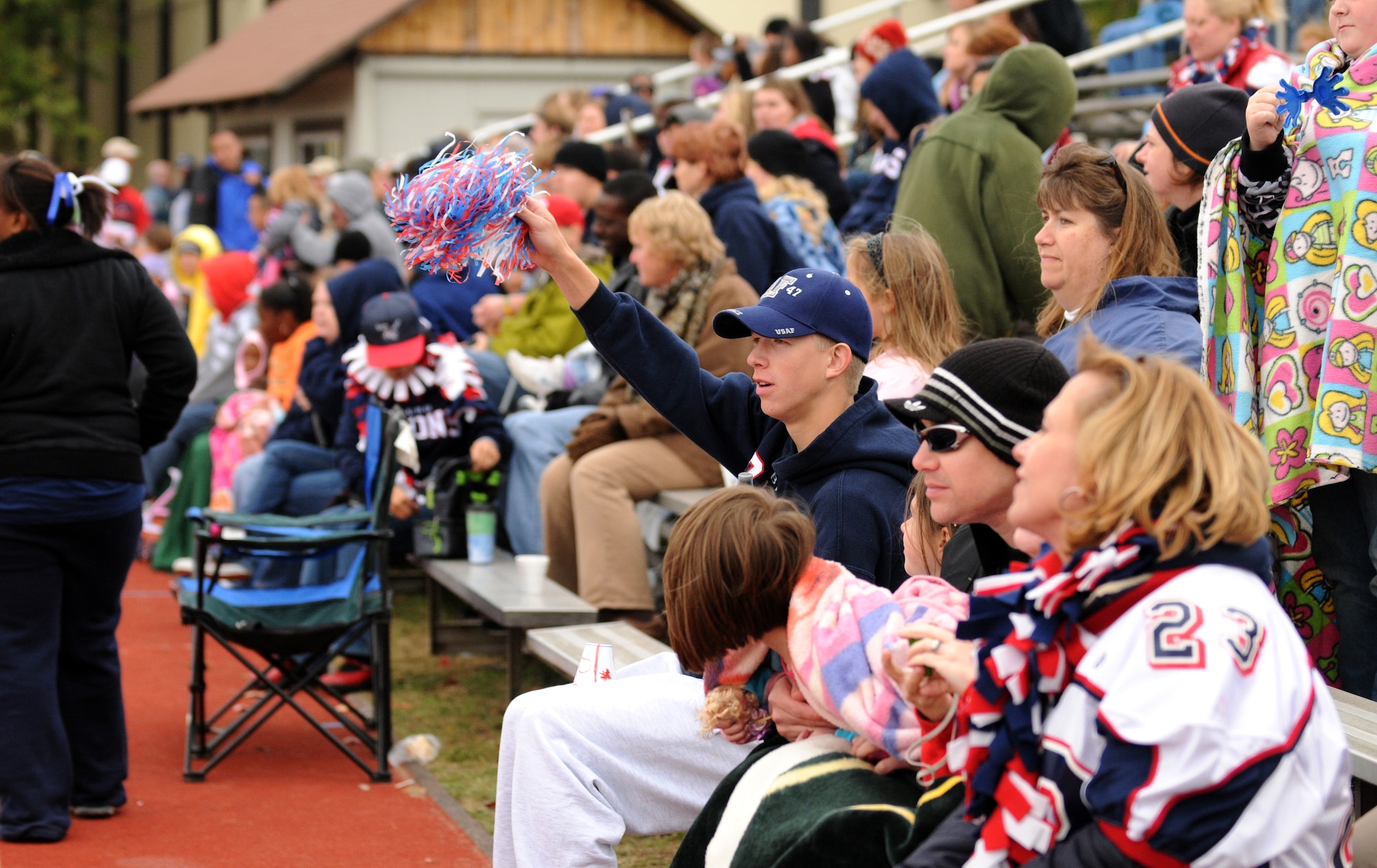 BITBURG ANNEX, Germany -- Friends and family of the Bitburg Barons show their support for the football team Oct. 3 at the Bitburg High School homecoming game. The Barons defeated the Mannheim Bison 35-0. (U.S. Air Force photo/Airman 1st Class Nathanael Callon)