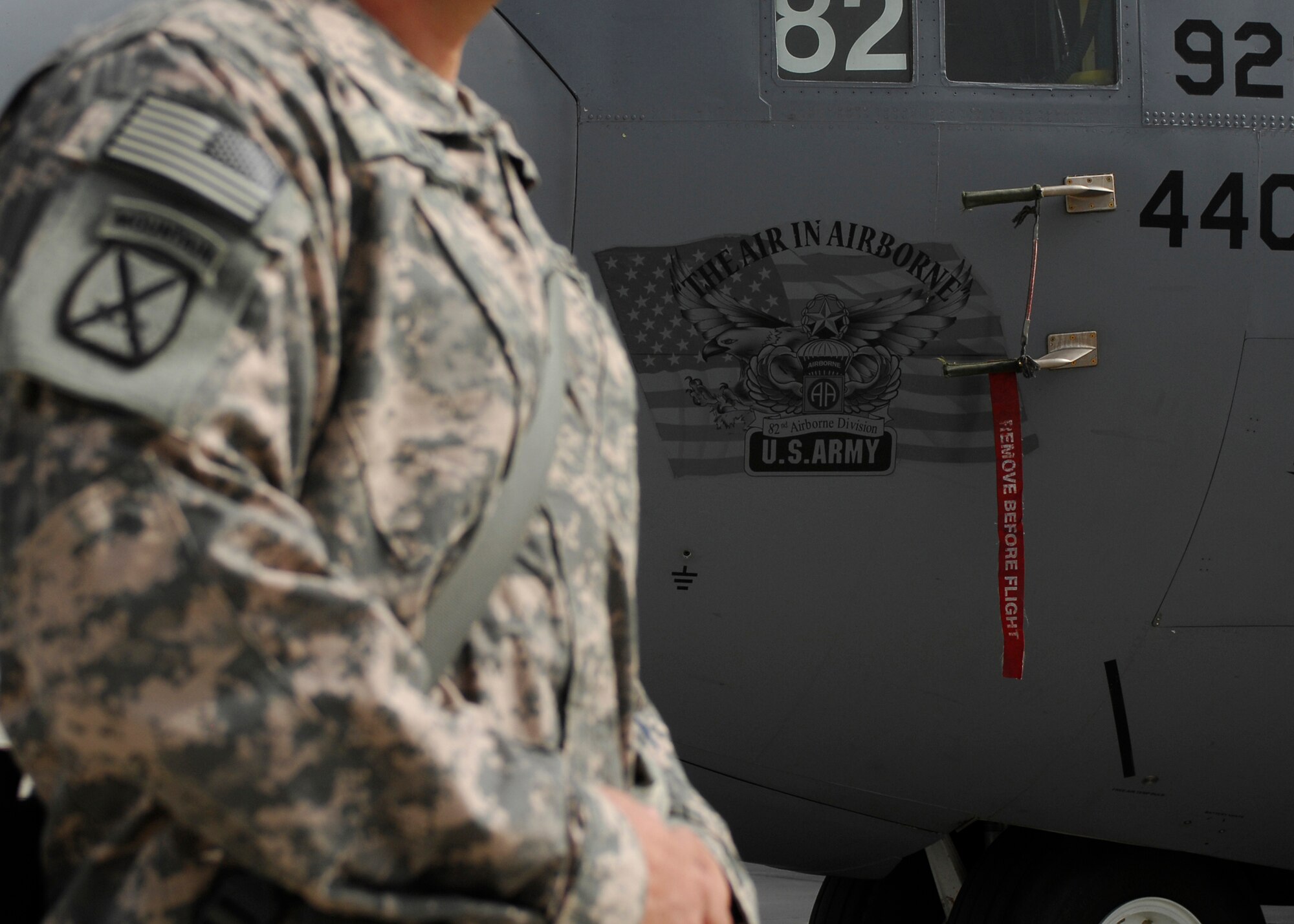 BAGRAM AIRFIELD, Afghanistan -- Servicemembers assembled on the flightline to tour a C-130 Hercules, from the 440th Airlift Wing at Pope Air Force Base, N.C., here, Oct. 5, 2009.  The C-130 was dedicated to the Army's 82nd Airborne Division in honor of the cohesion of the Air Force and the Army in Afghanistan and was put on display for servicemembers to view the aircraft.  (U.S. Air Force photo/Senior Airman Felicia Juenke)
